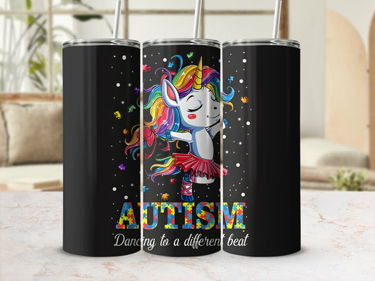 Black tumbler with unicorn dancing, "AUTISM Dancing to a different beat" text.