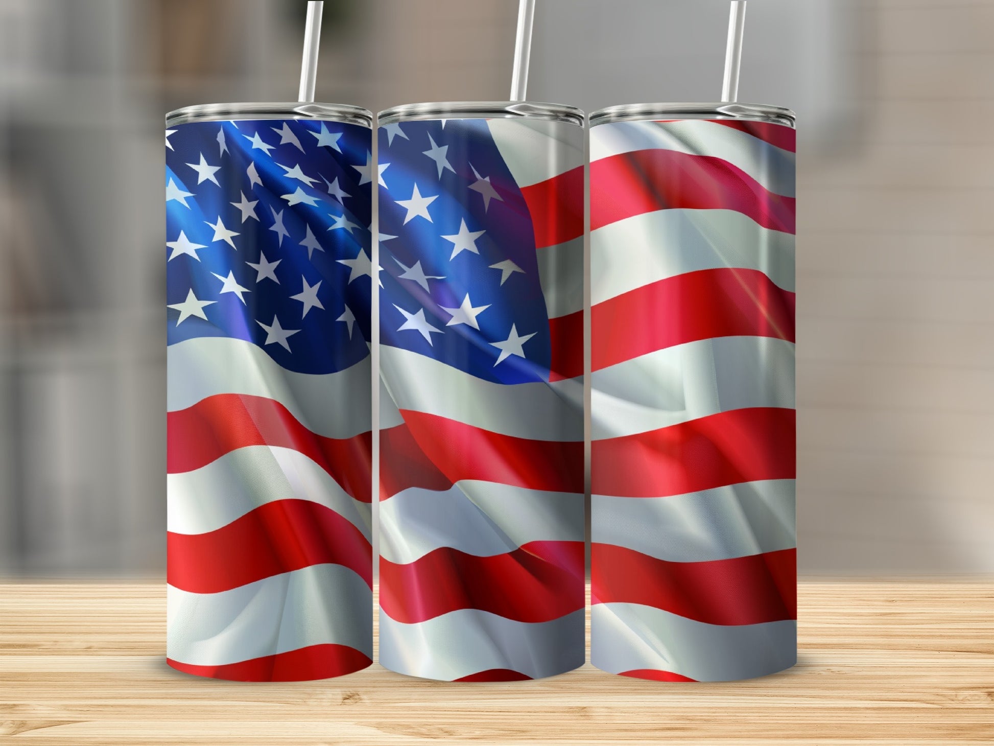 Three tumblers decorated with the American flag design.