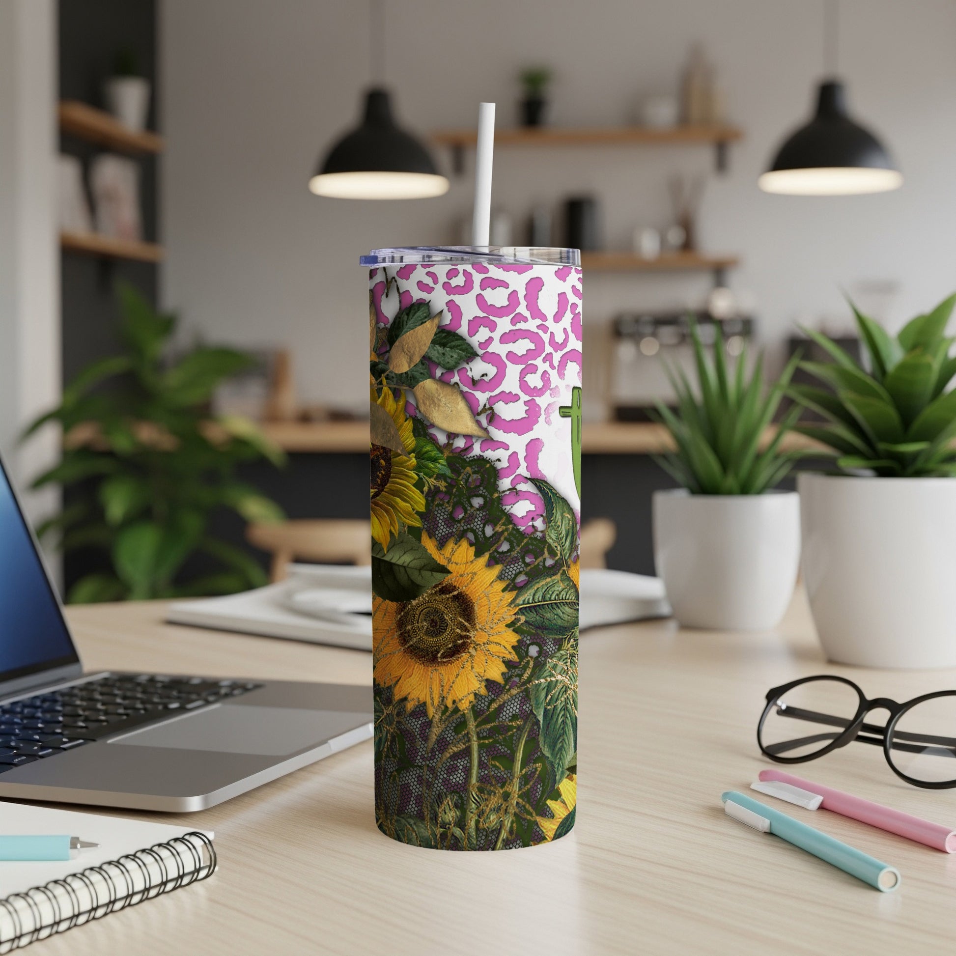 White tumbler with leopard print and sunflower design.