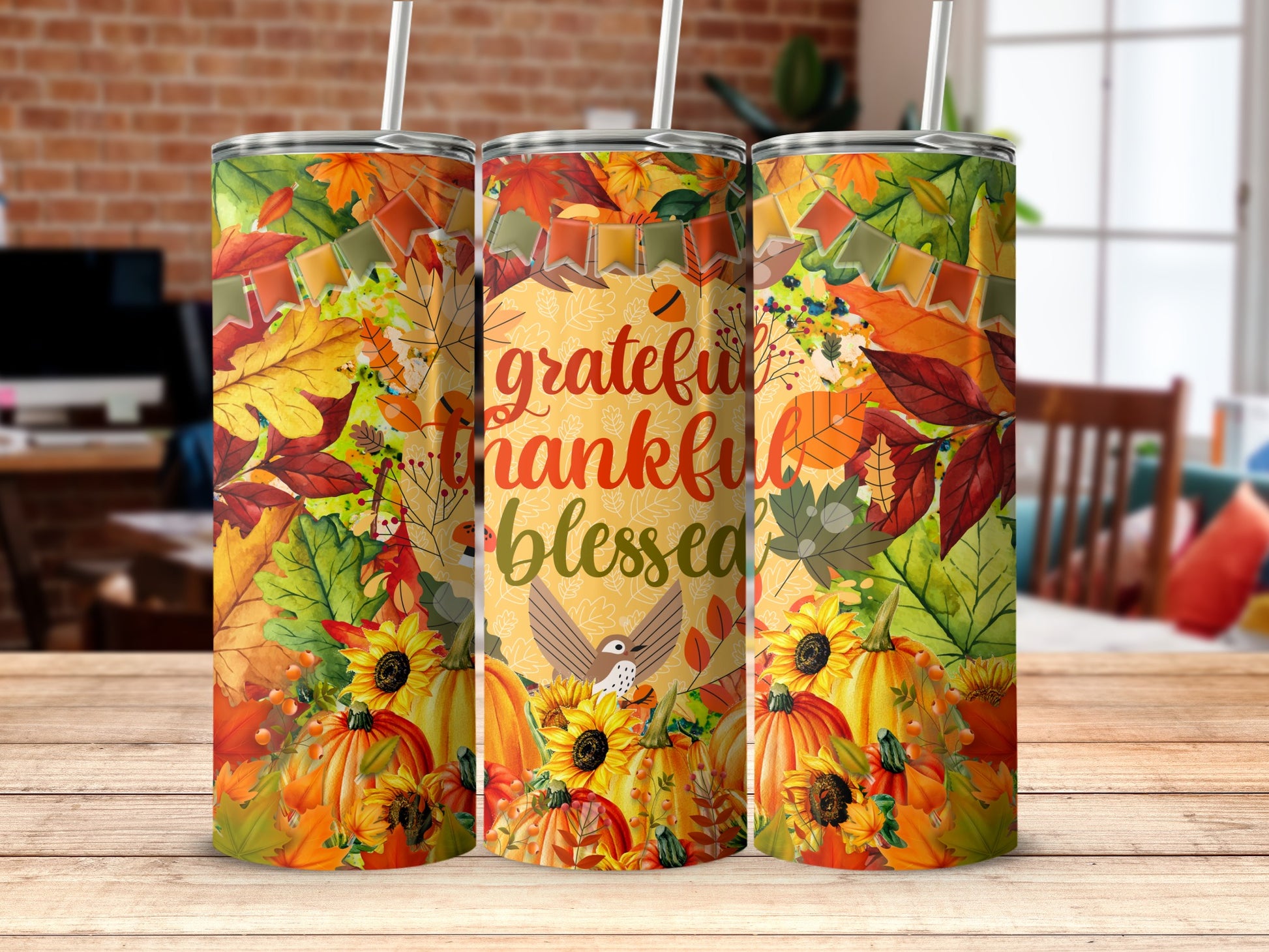 Thanksgiving tumbler with pumpkins, sunflowers, and autumn leaves.