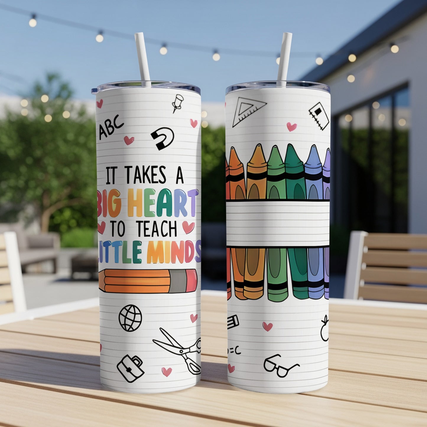 Tumbler with colorful crayons and "It takes a big heart to teach little minds" text.