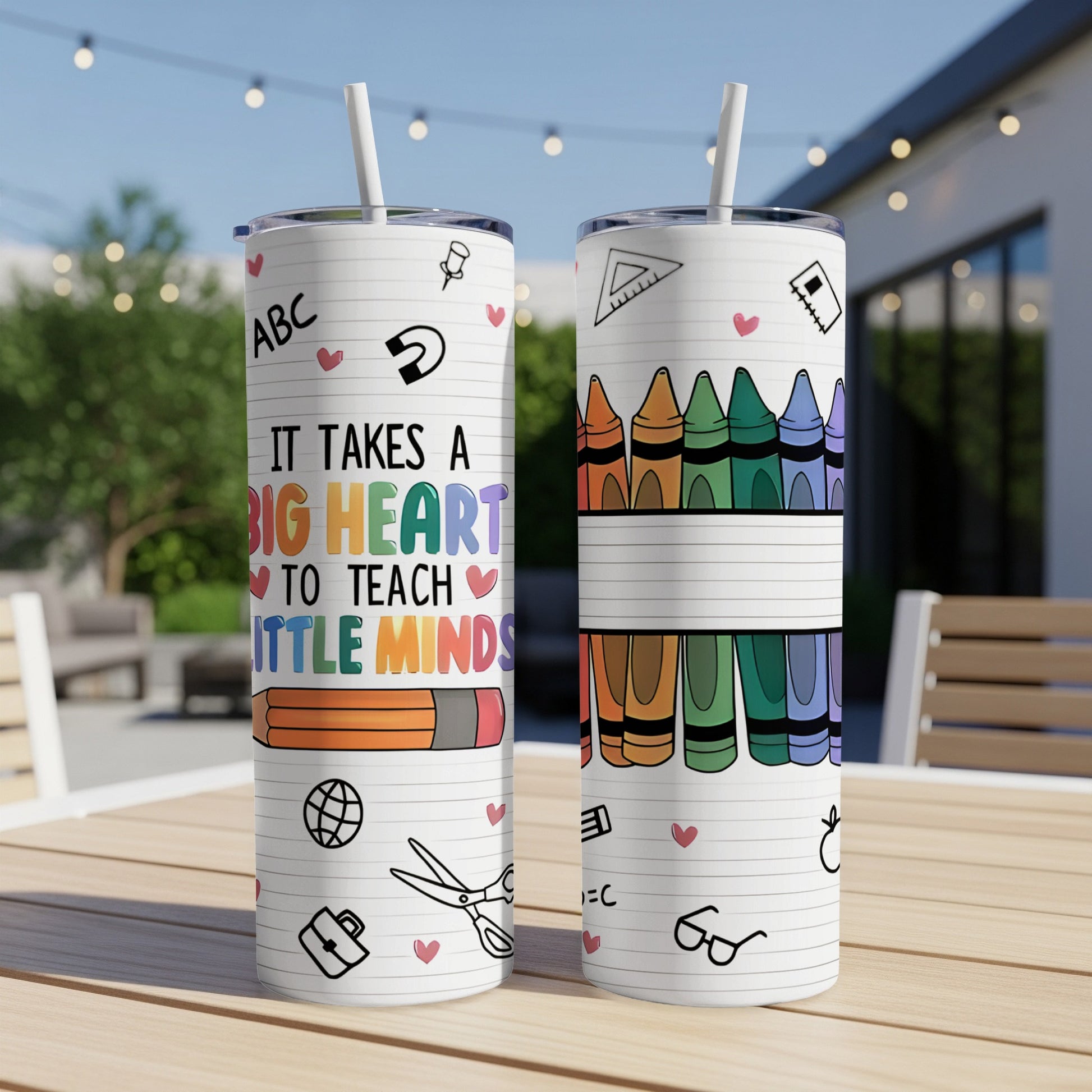 Tumbler with colorful crayons and "It takes a big heart to teach little minds" text.