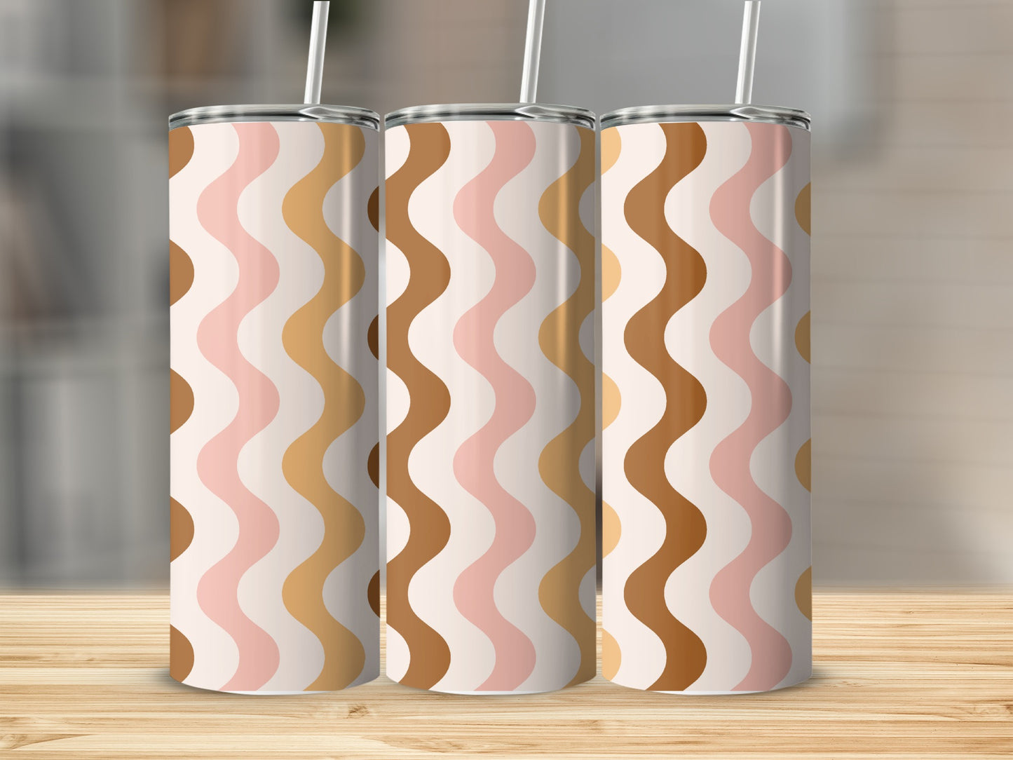 Three tumblers with a wavy pattern in cream, pink, brown, and tan.