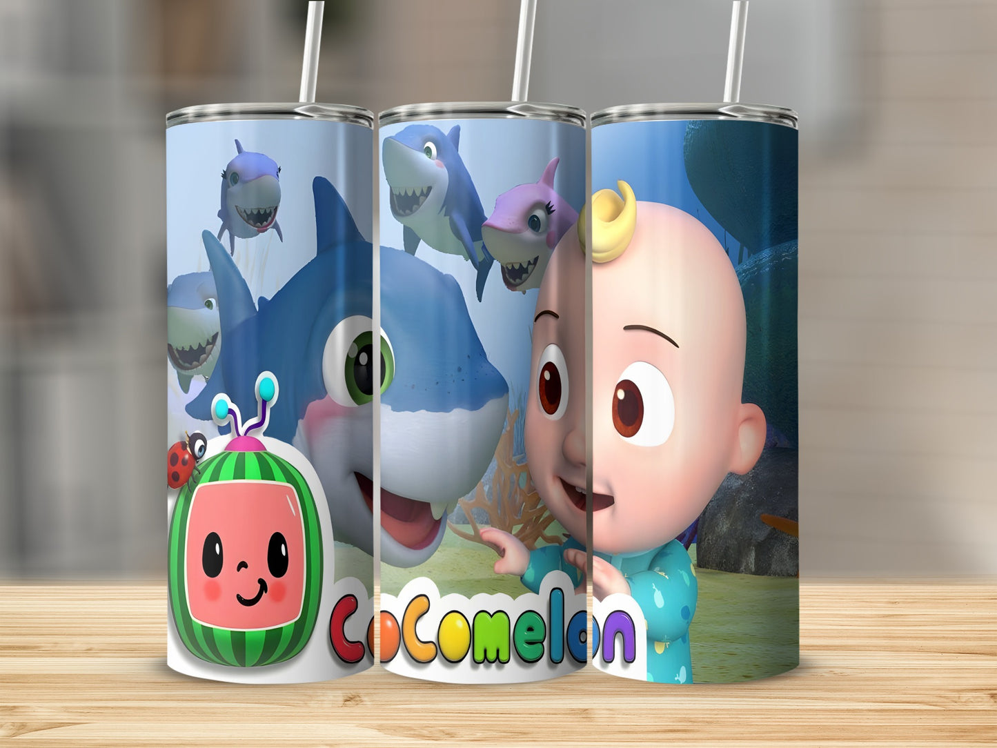 Three Cocomelon tumblers with JJ and sharks, a ladybug, and bubbles.