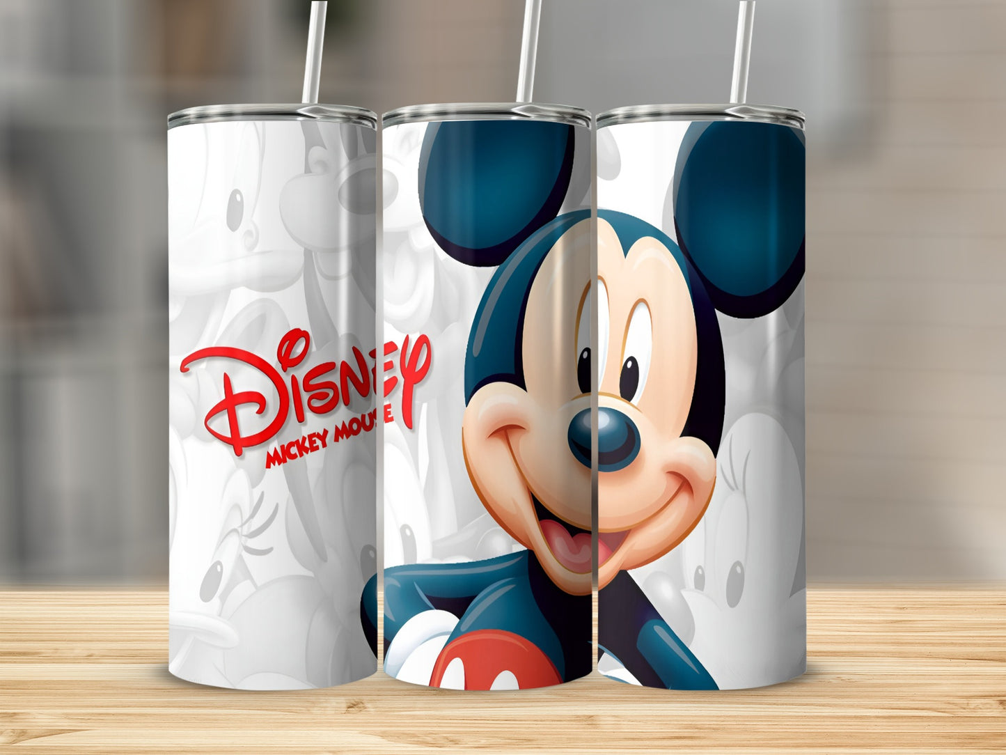 Mickey Mouse Disney logo and character on a tumbler.