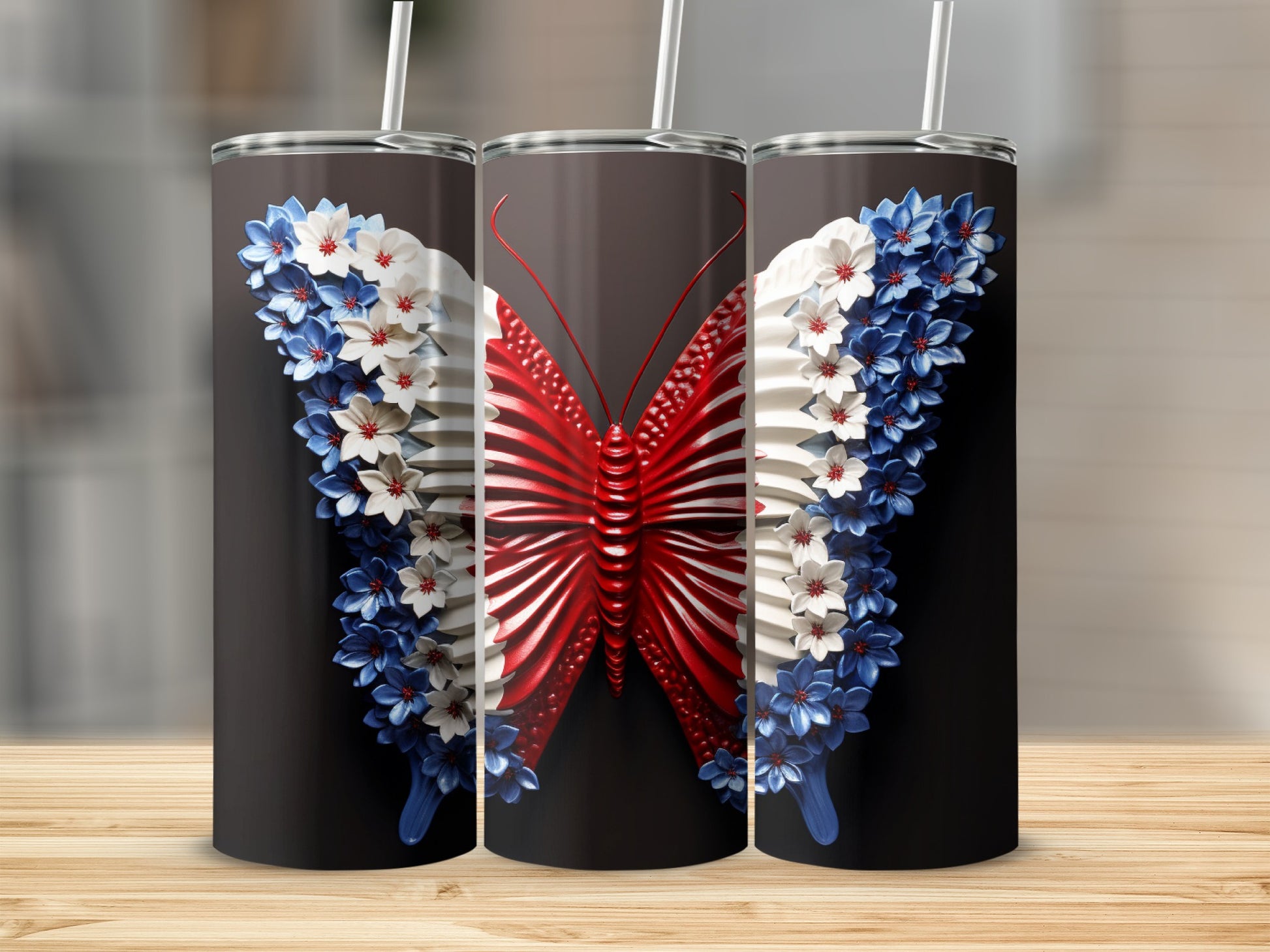Butterfly tumbler with red, white, and blue floral wings.