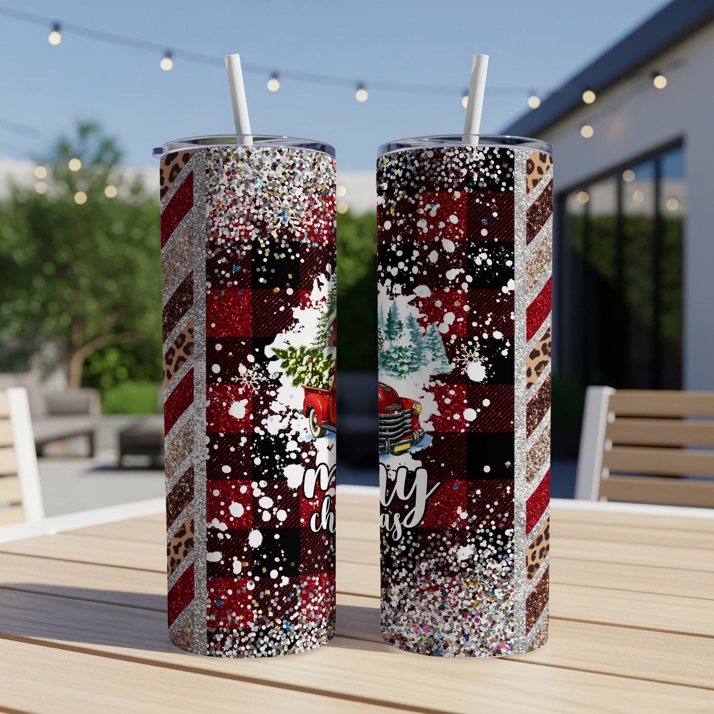Two insulated tumblers with buffalo plaid, glitter, and festive Christmas truck graphics.
