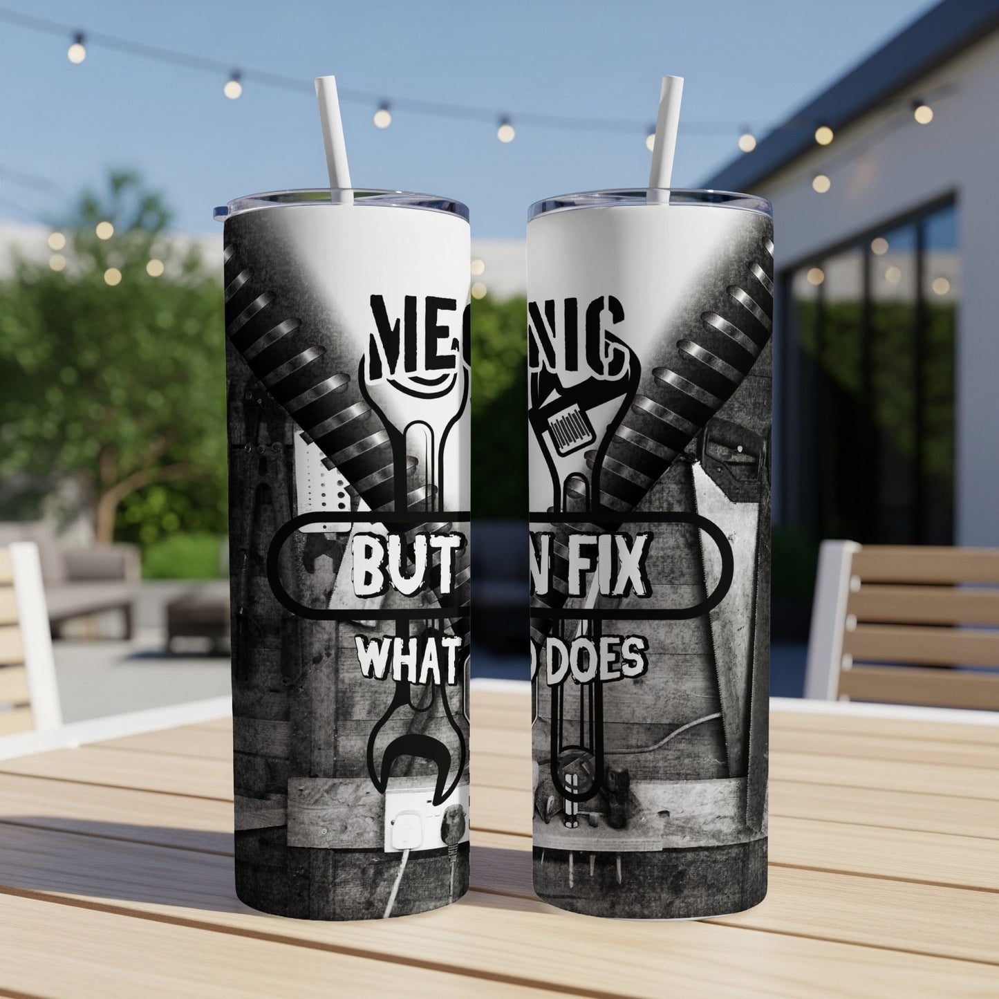 Mechanic saying "Mechanic by trade, but fix anything that does" on a tumbler.