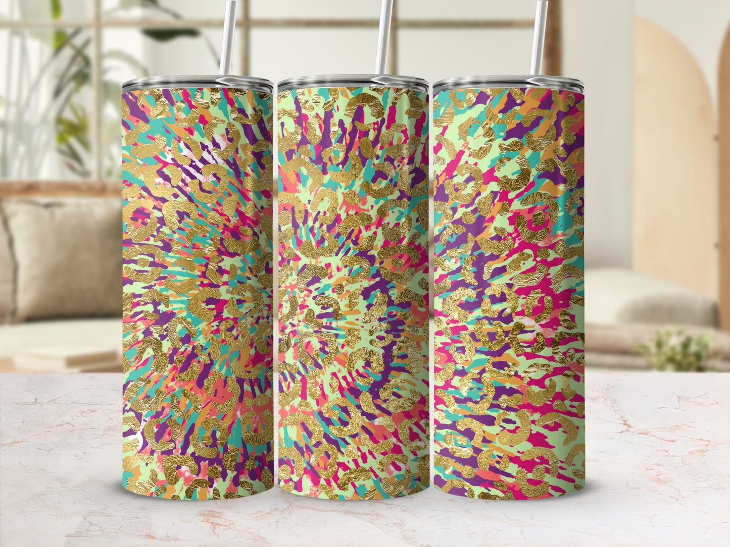 Three tumblers with a colorful abstract gold leopard print pattern.