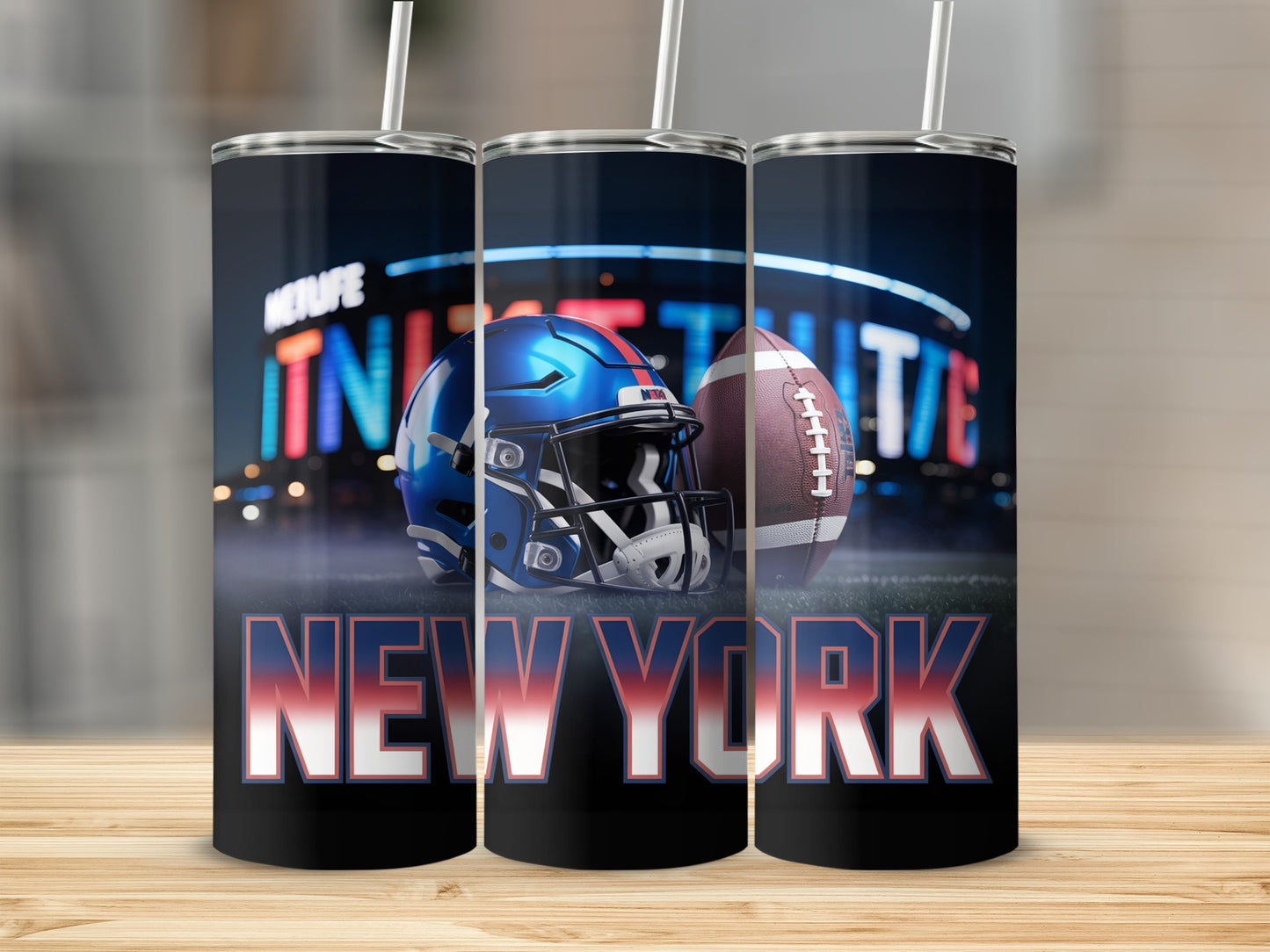 New York Giants helmet, football, and stadium lights on a tumbler.