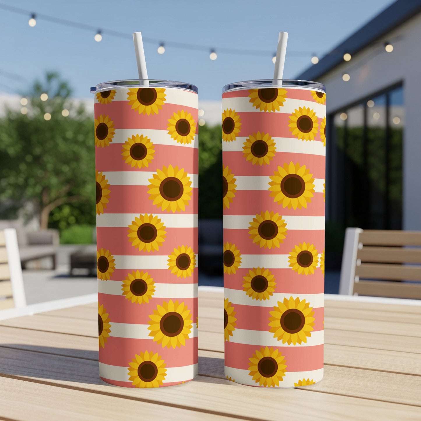 Two tumblers with a coral and white stripe pattern, adorned with sunflowers.