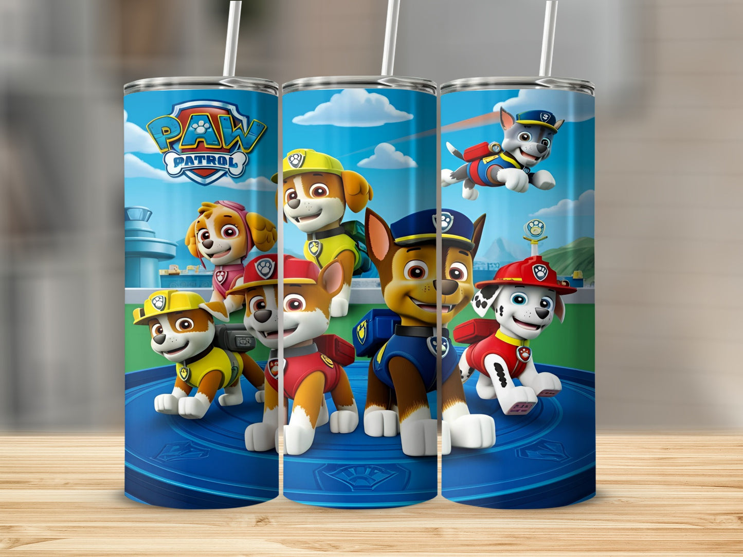 Paw Patrol characters Chase, Marshall, and Skye on blue platform with cityscape background.