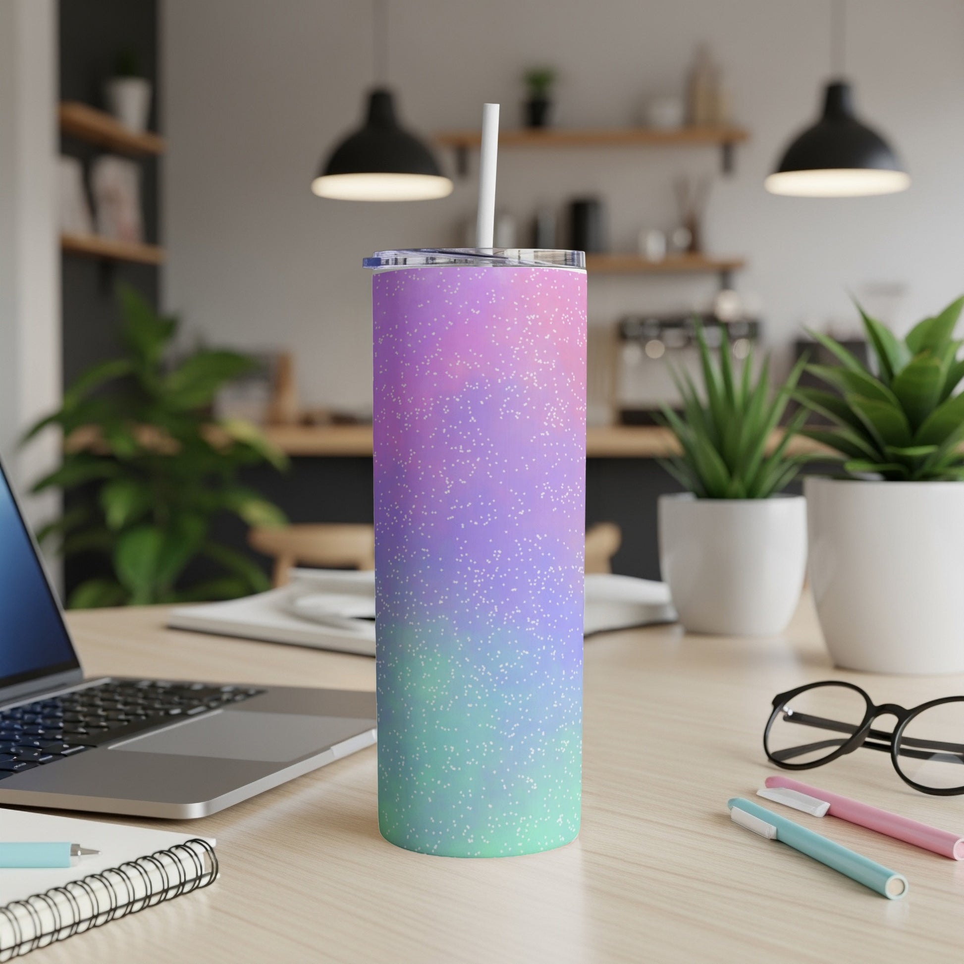 Glitter gradient straw tumbler in purple, pink, and mint green.