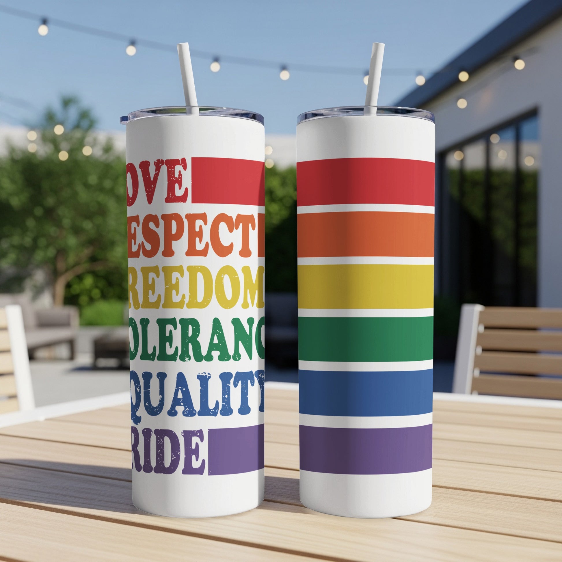 Rainbow striped tumblers with Pride-themed text: love, respect, freedom, equality, pride.
