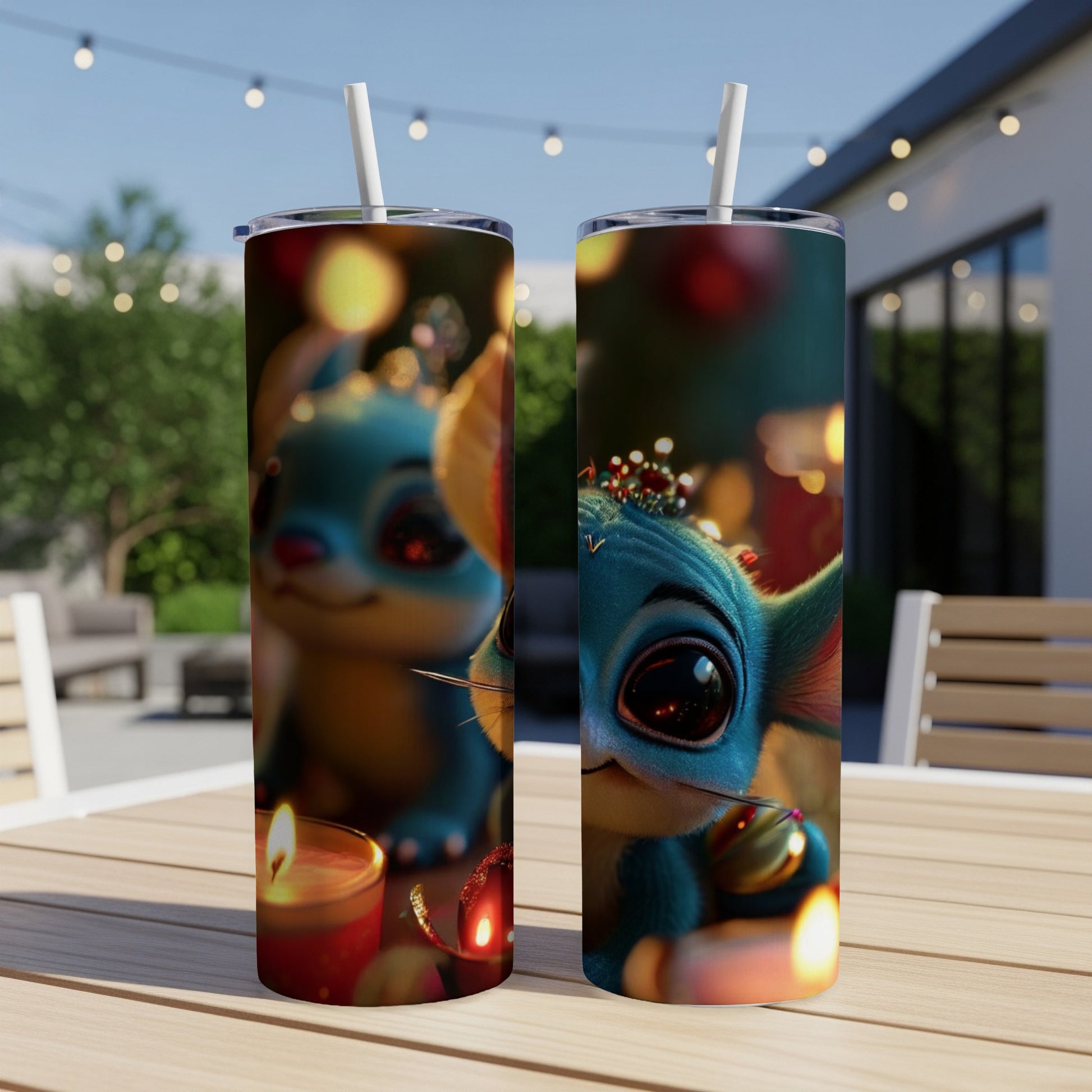 Two tumblers featuring a cartoon alien character in festive holiday decorations.