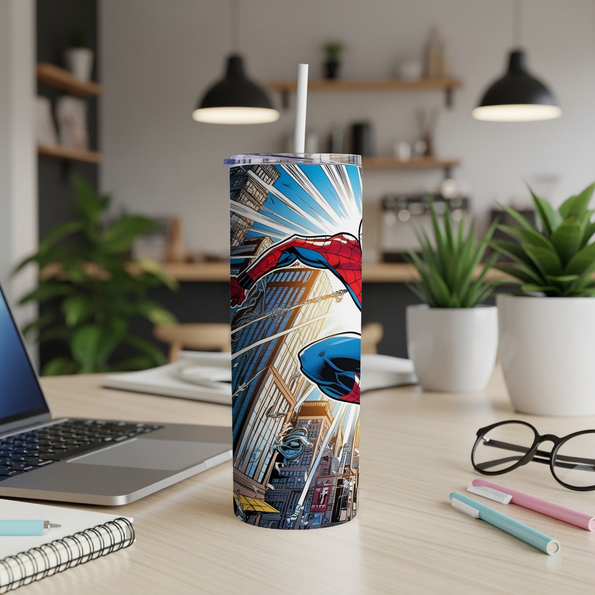 Spiderman soaring over a comic-style cityscape on a stainless steel tumbler.