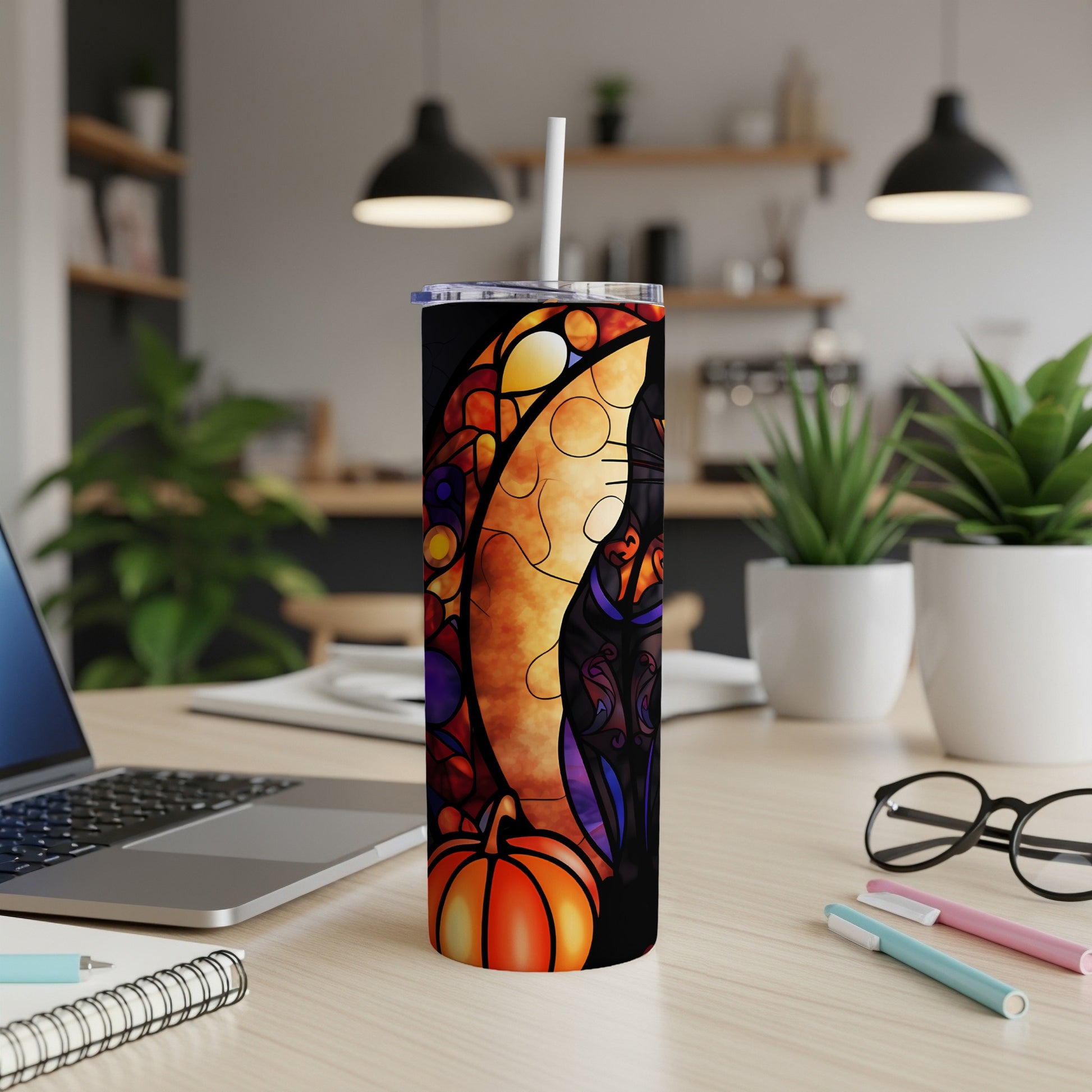 Black cat and pumpkin on a stained-glass-style Halloween tumbler.