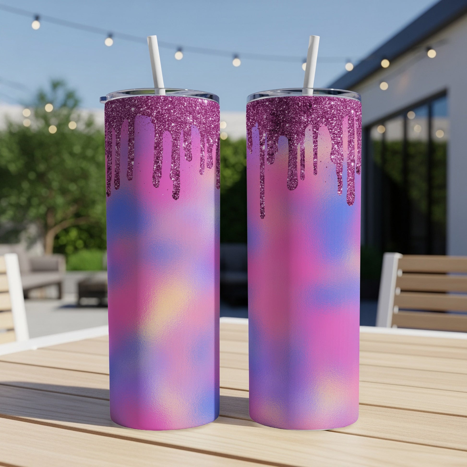 Two tall tumblers with pink, purple, and blue glitter drip design.