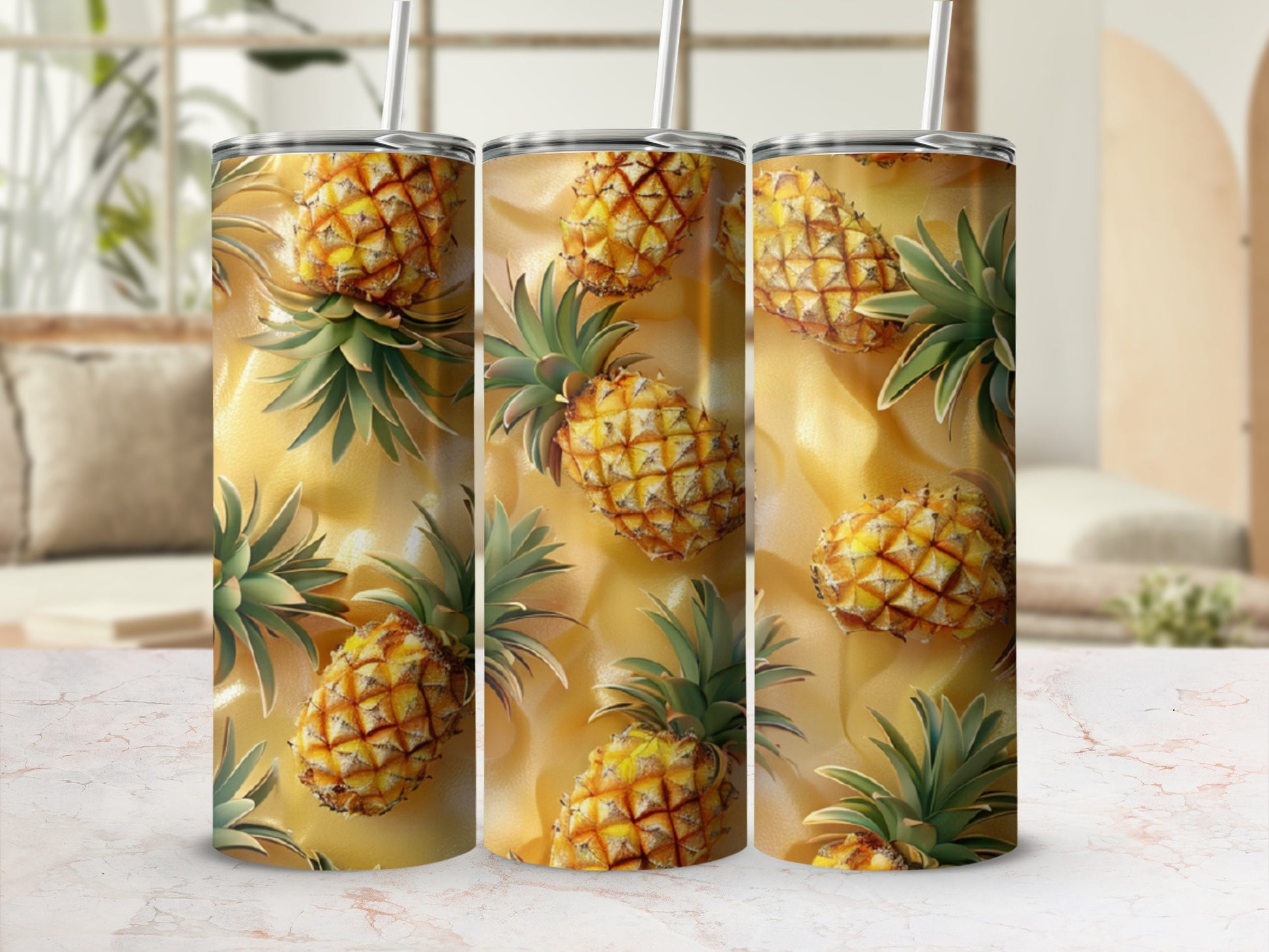 Three tumblers with pineapple pattern on a textured gold background.