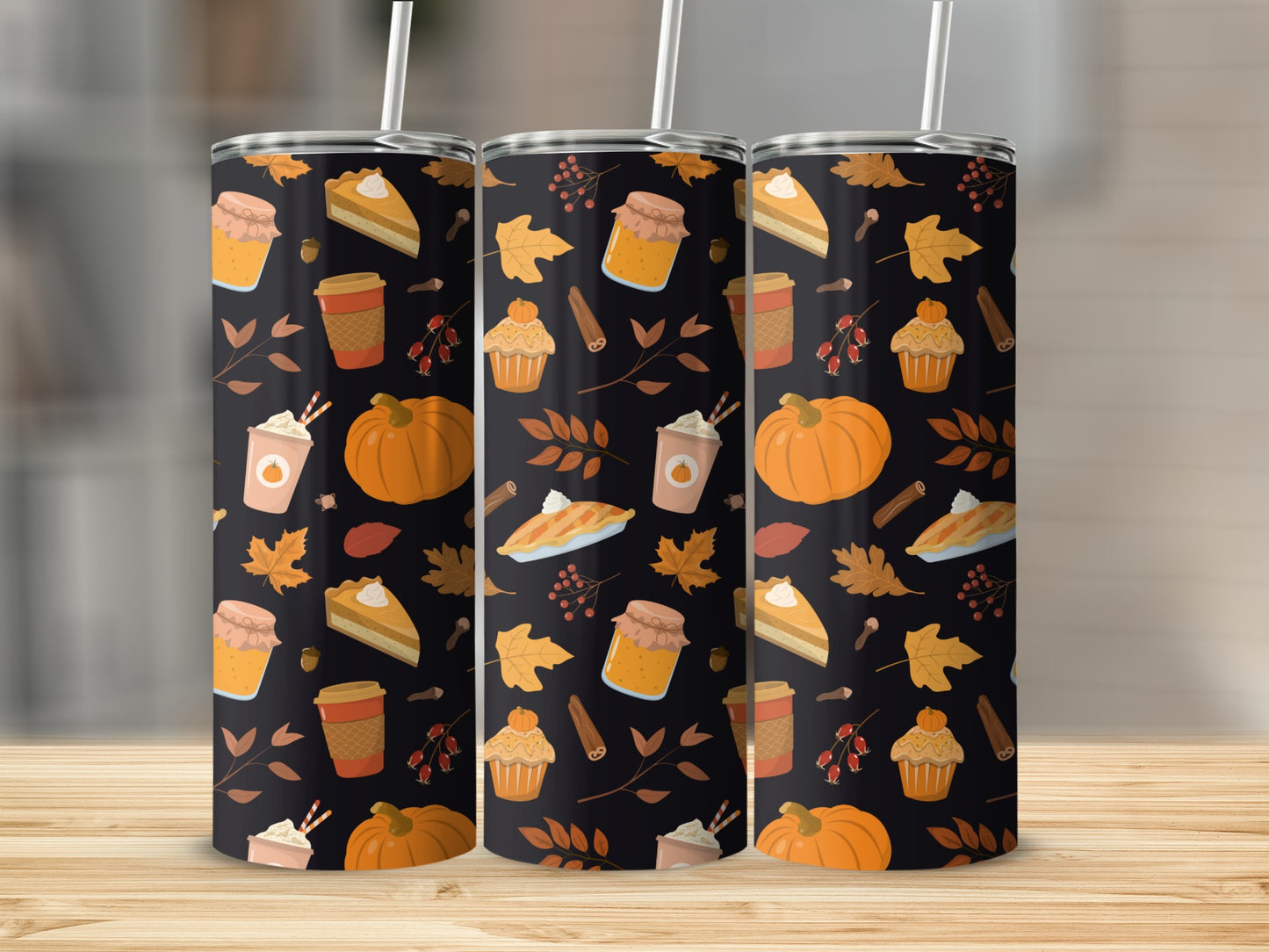 Three tumblers with a fall harvest pattern of pumpkins, pies, and leaves.