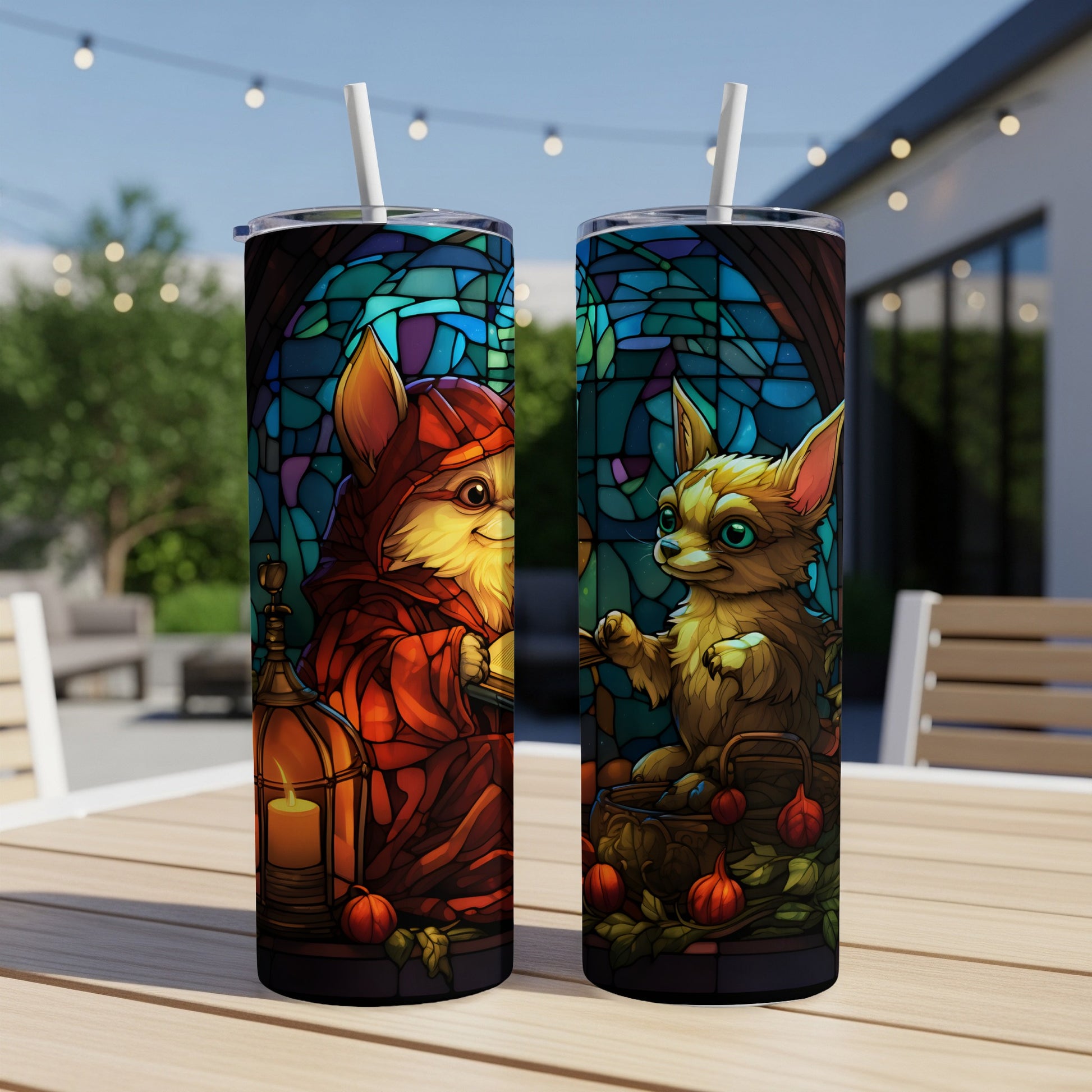 Two tumblers with stained-glass art of anthropomorphic foxes and chihuahuas, with pumpkins and a lantern.