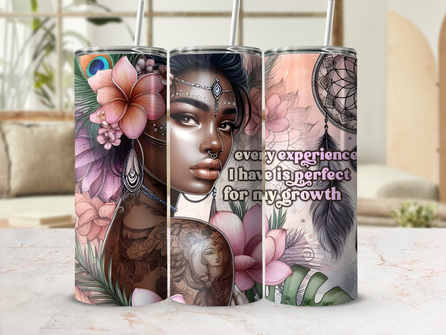 Tumbler with floral and feather design featuring text "every experience I have is perfect for my growth."