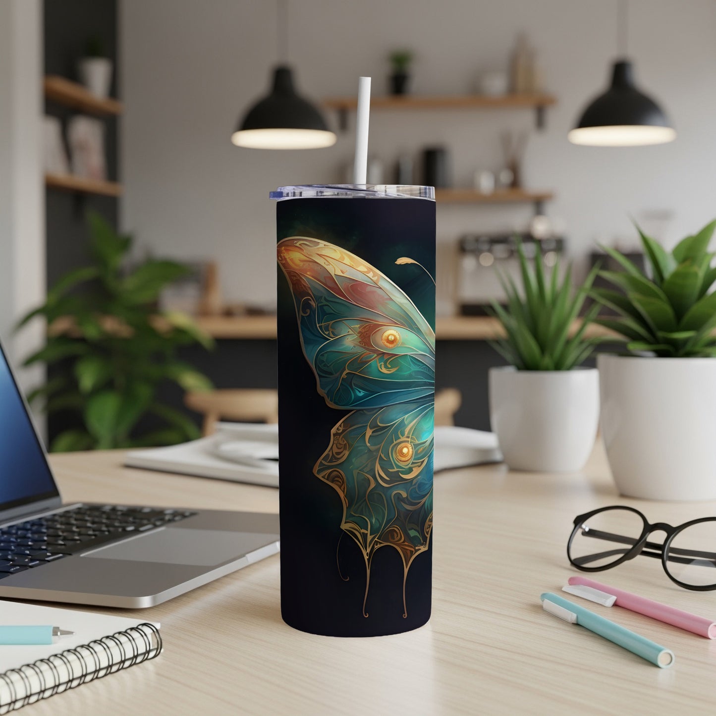 Black tumbler with iridescent butterfly wing design.