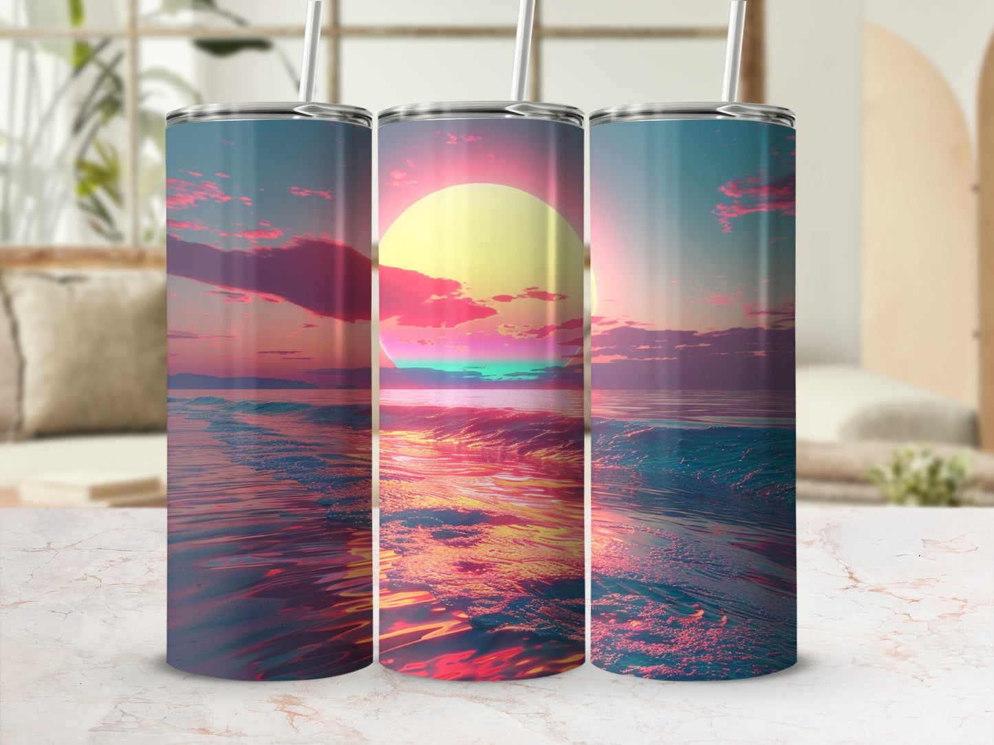 Three tumblers with a sunset ocean wave design.