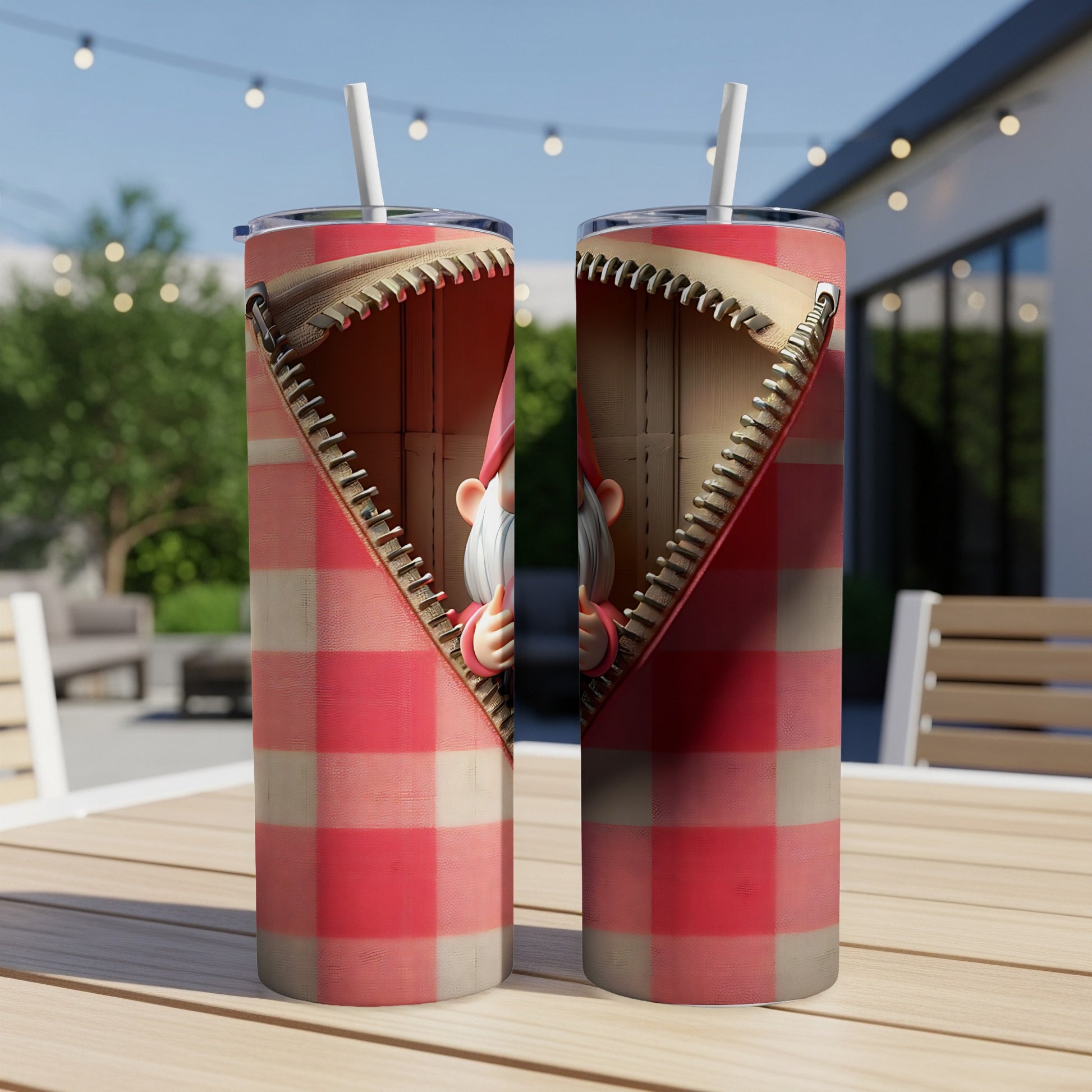 Two tumblers with a red and white buffalo plaid pattern and a gnome peeking out from a zipper.
