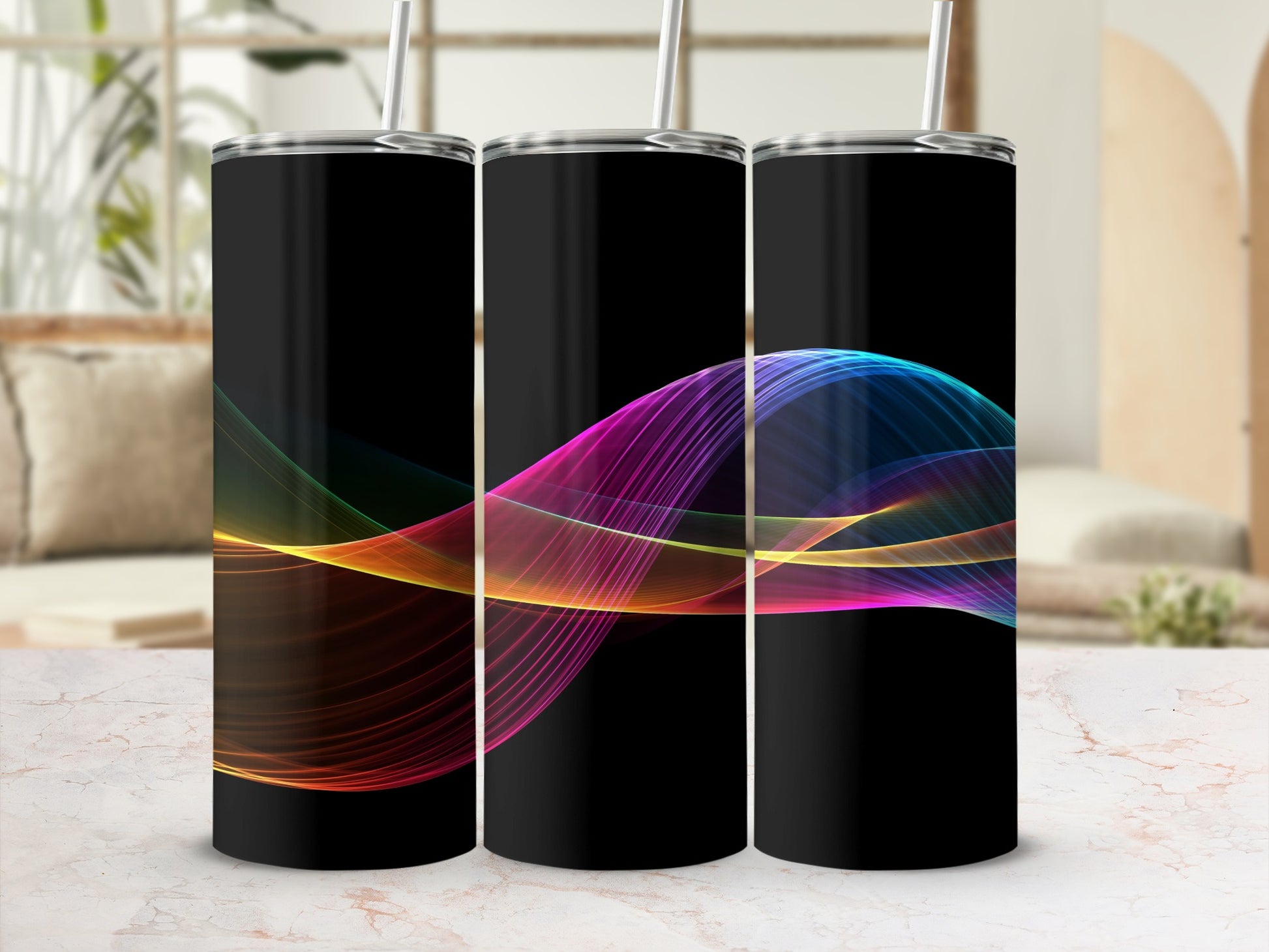 Three black tumblers with colorful abstract wave patterns.