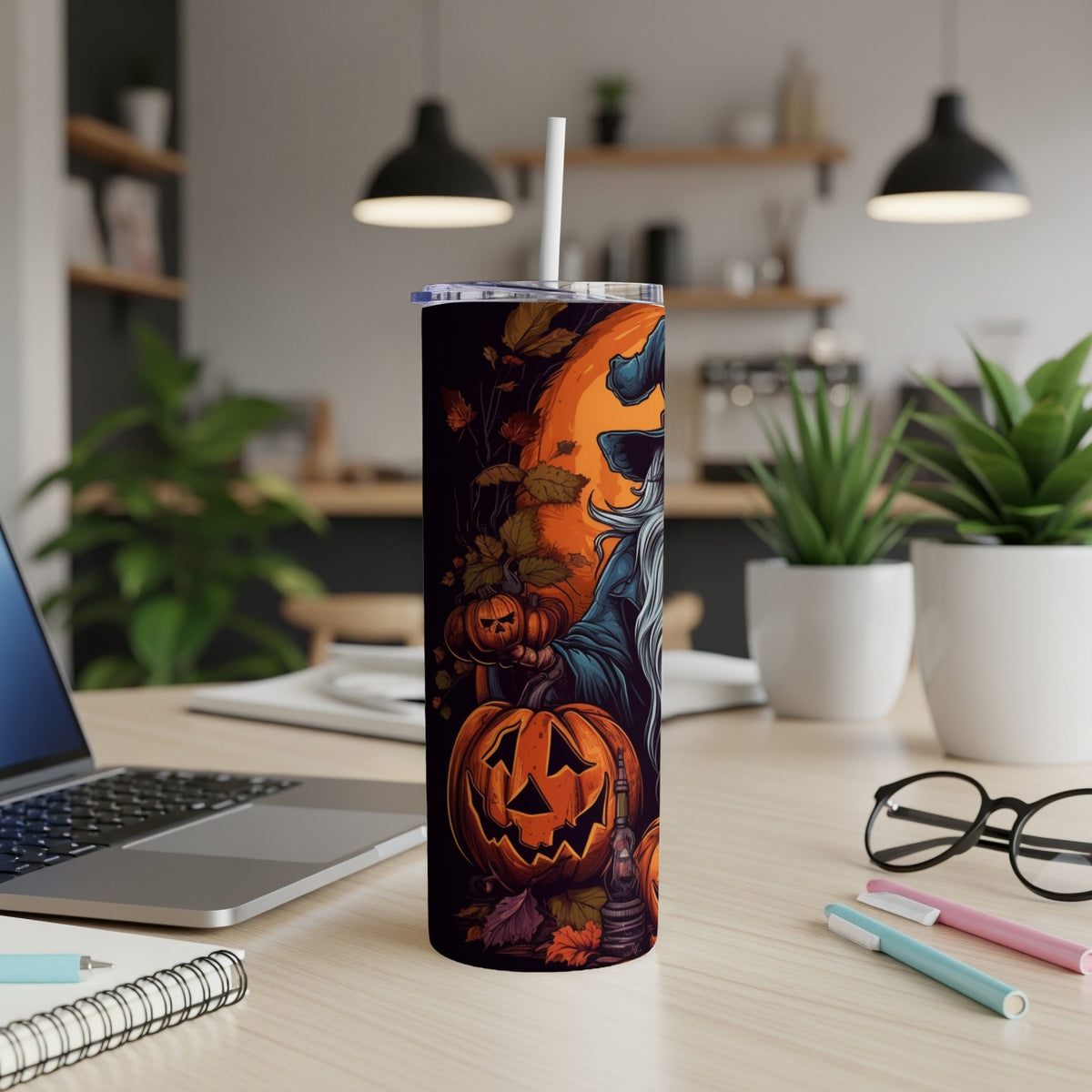 Halloween tumbler with jack-o'-lanterns and a wizard against an orange moon background.