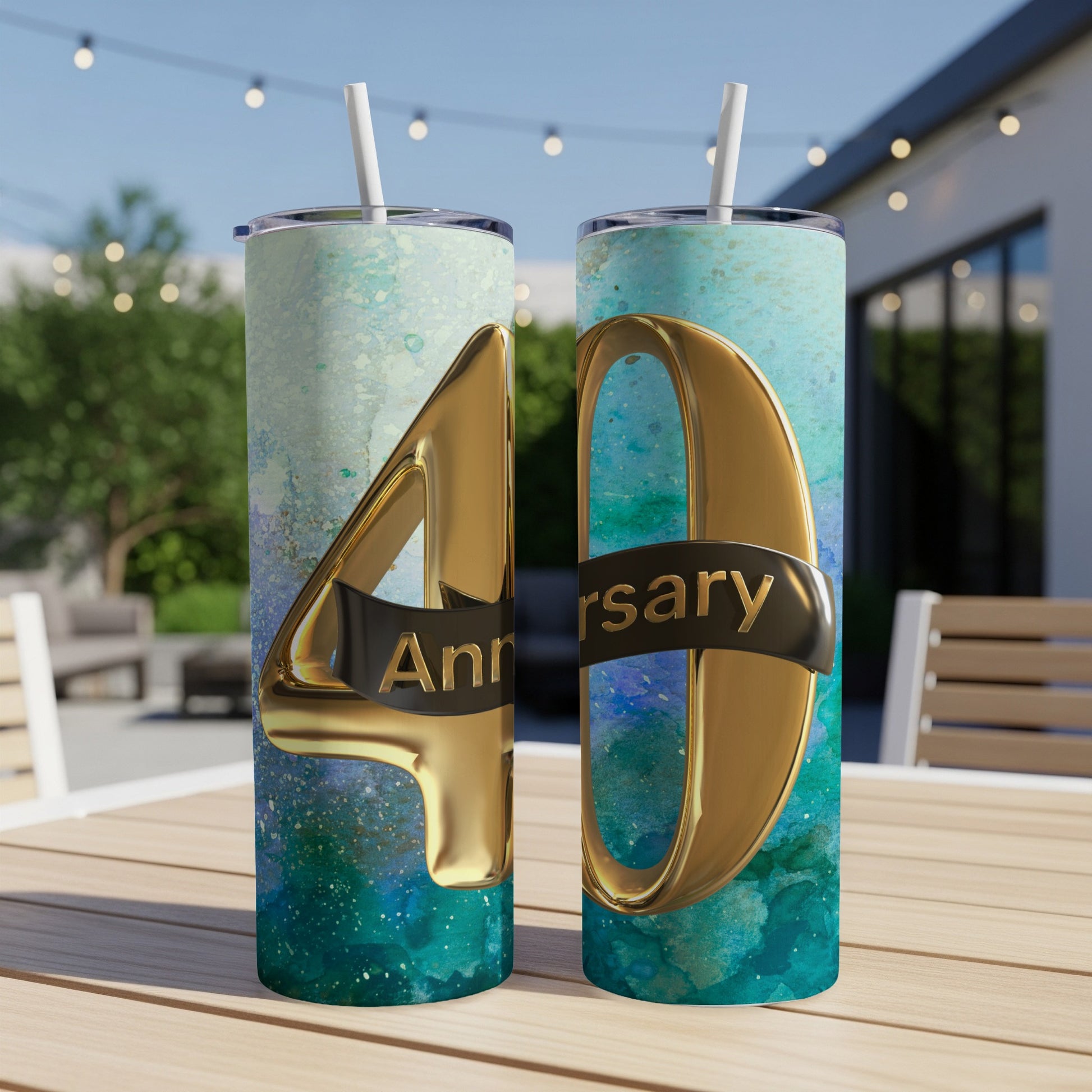Gold '40' anniversary text on teal and green abstract patterned tumblers.