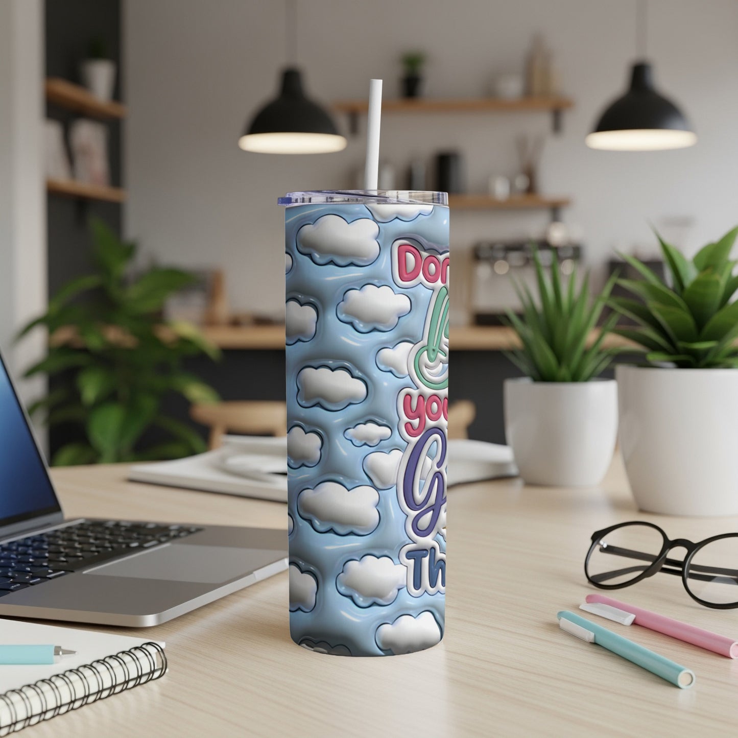 Cloud pattern tumbler with text "Don't you forget This".