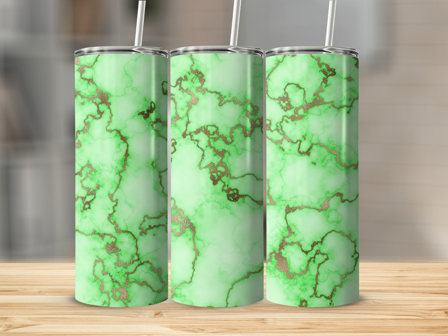 Three tall tumblers with a green marble and gold veining design.