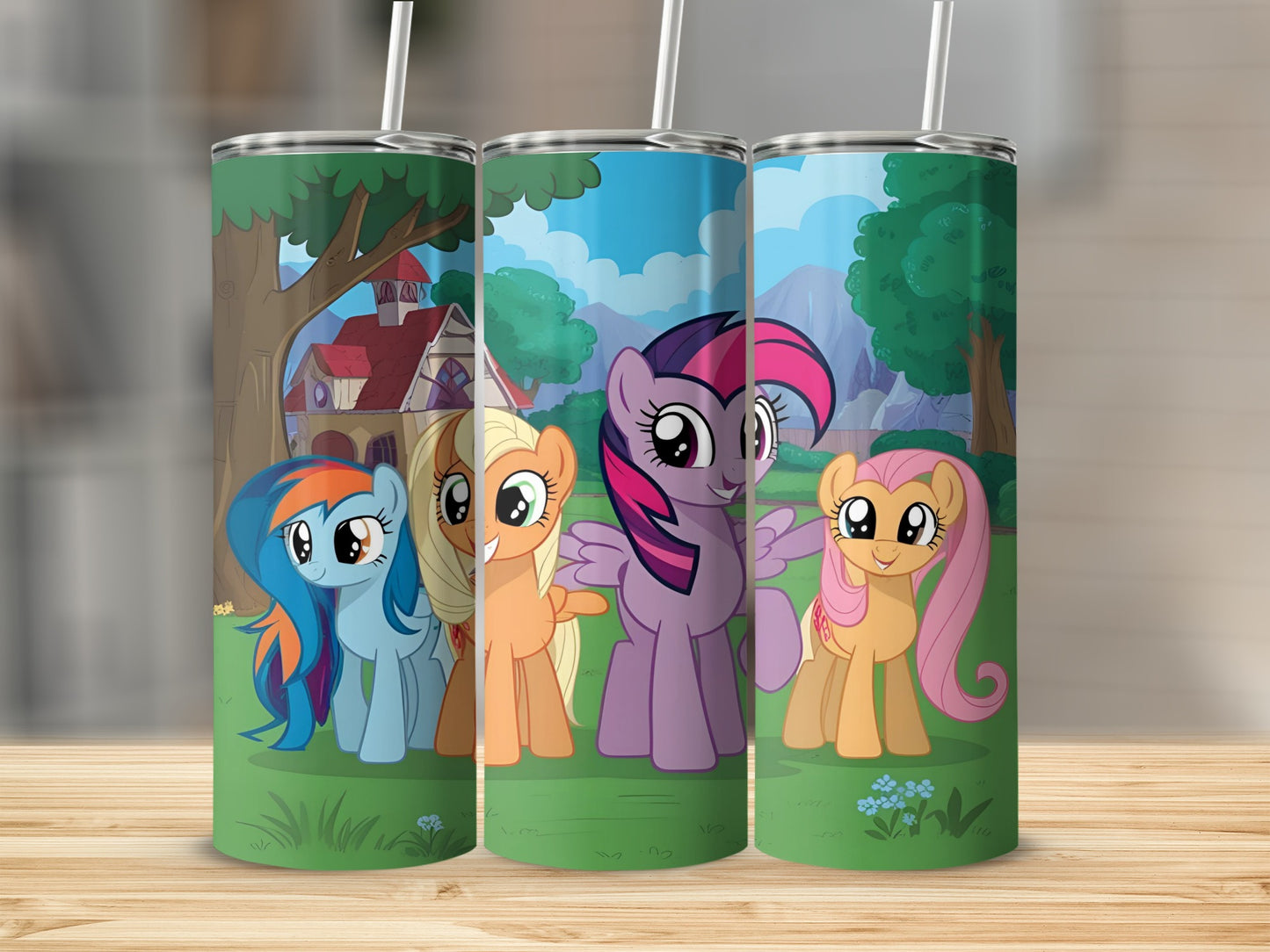 My Little Pony characters Rainbow Dash, Applejack, Twilight Sparkle, and Fluttershy on a colorful tumbler.