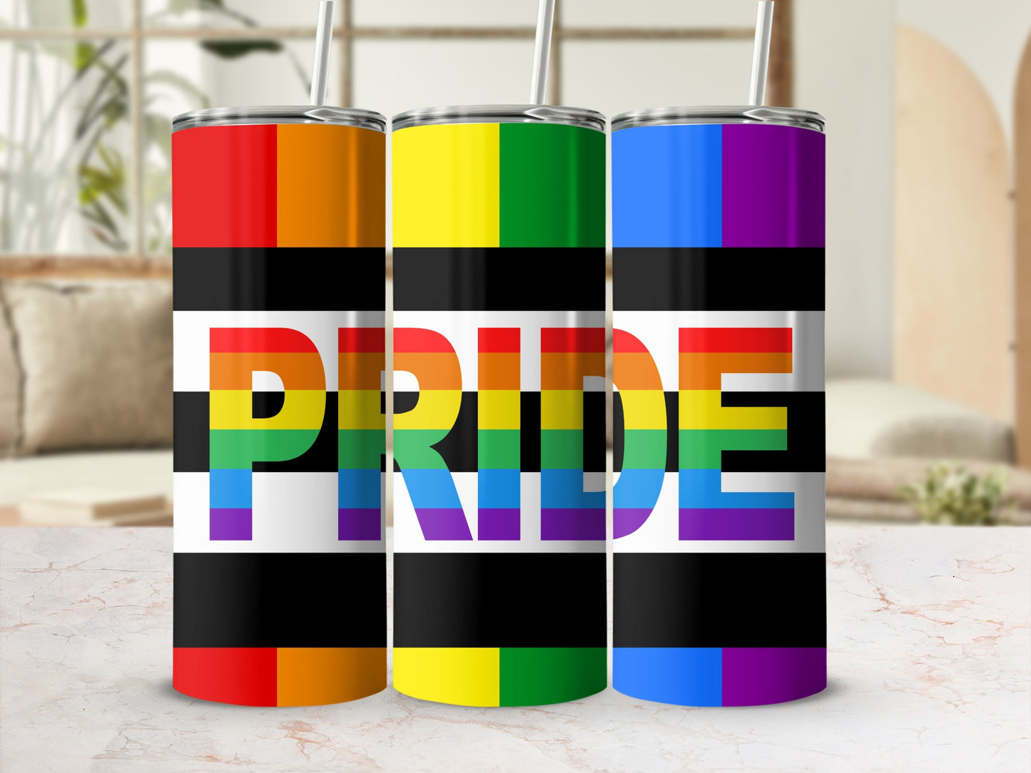 Three tumblers with rainbow pride flag stripes and "Pride" text.