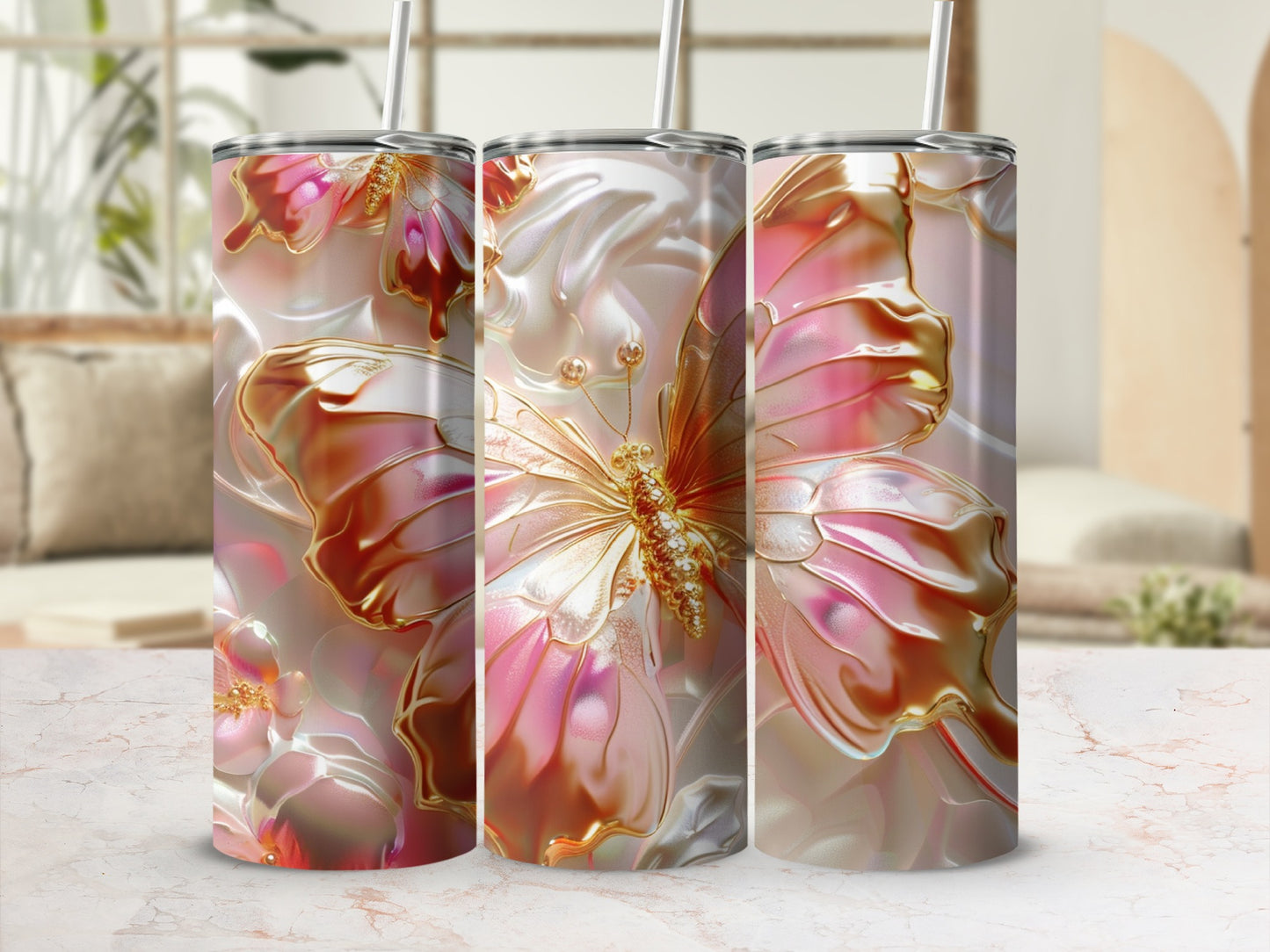 Pink and gold ornate butterfly tumbler with straw, in studio setting.