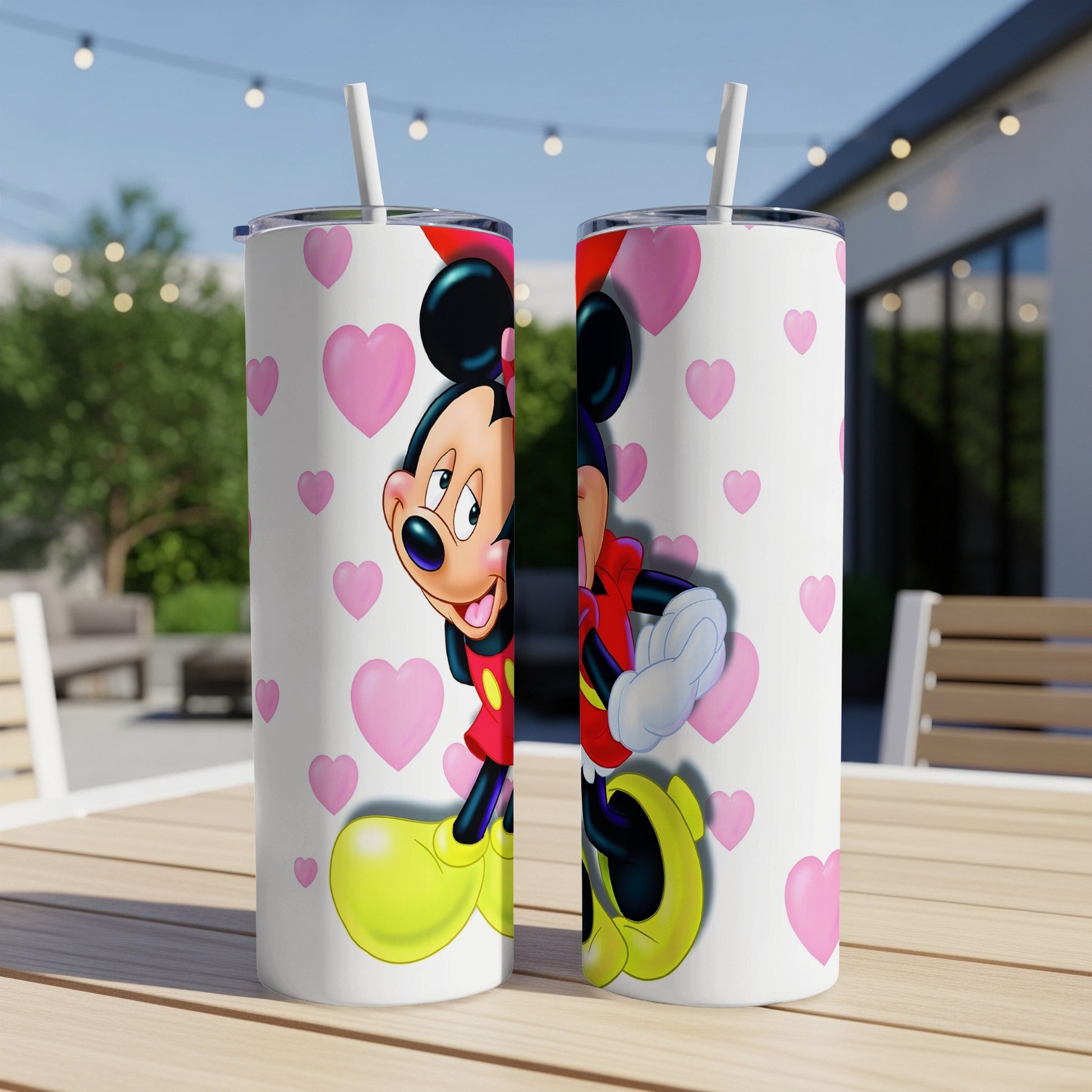 Mickey Mouse with pink hearts on white insulated tumblers.