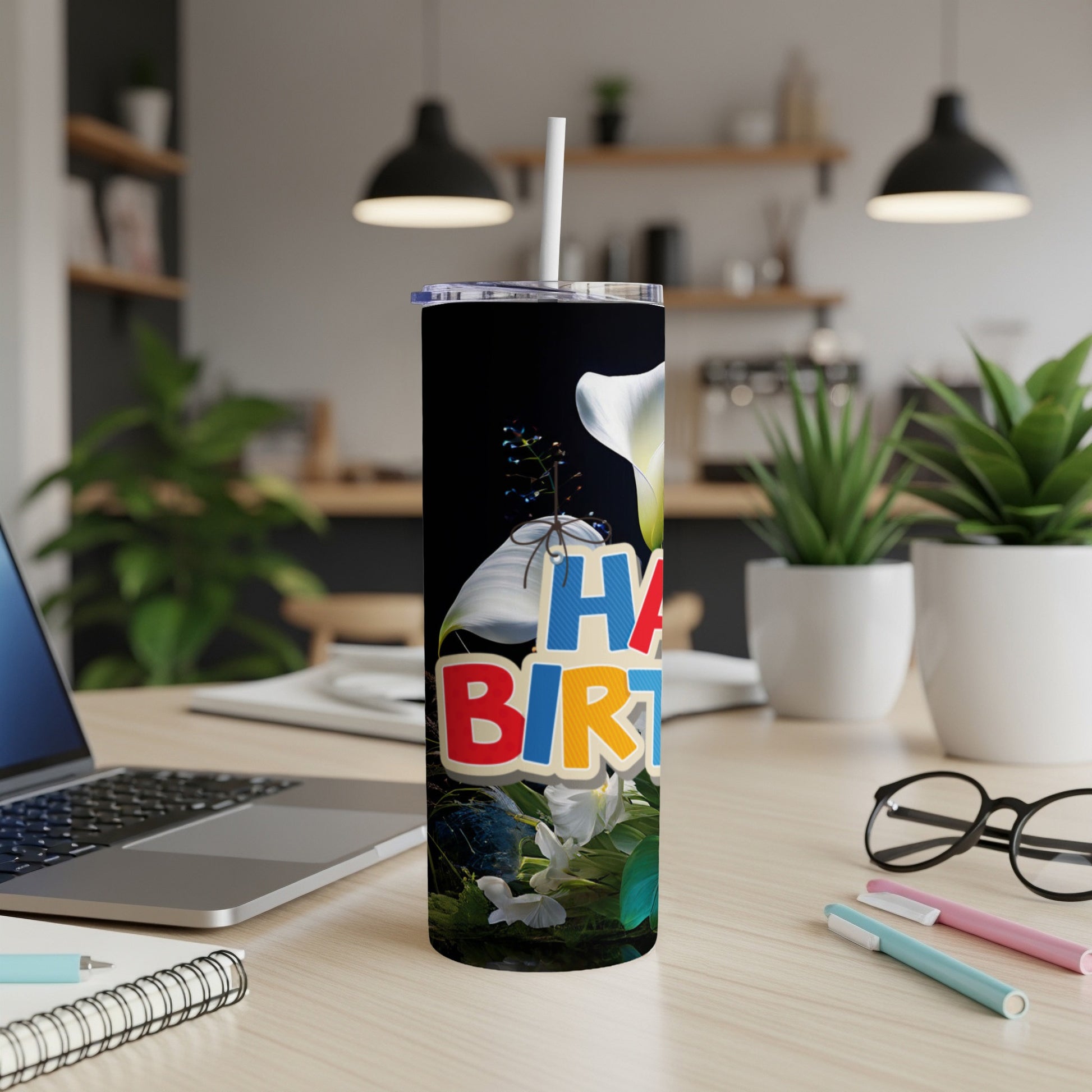 Black tumbler with "Happy Birthday" text and floral design.