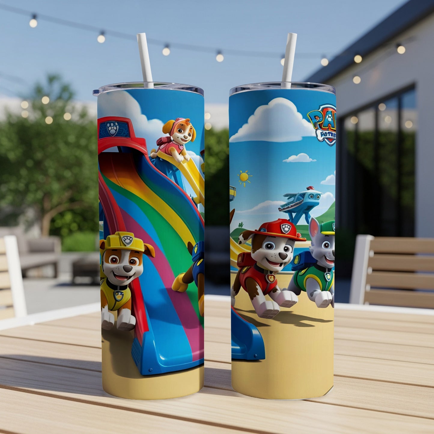 Paw Patrol characters on a beach slide and sand.
