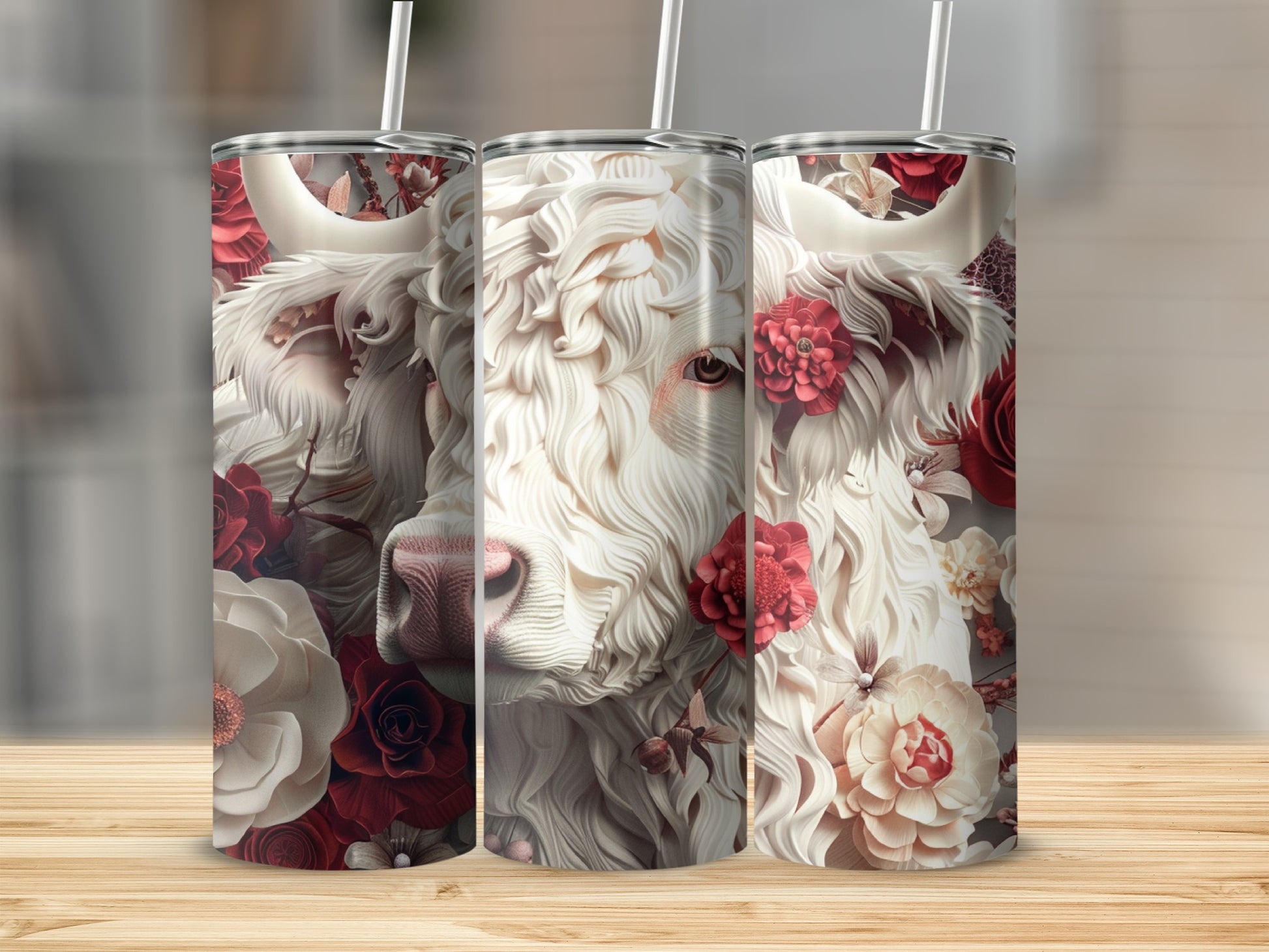 White cow with red and cream flowers, on a tumbler.