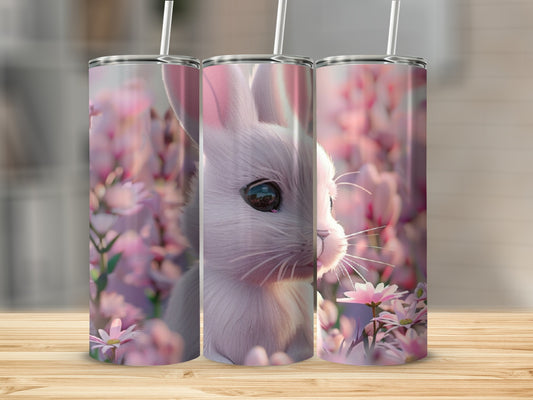 Pink bunny face and flowers on a three-panel tumbler.