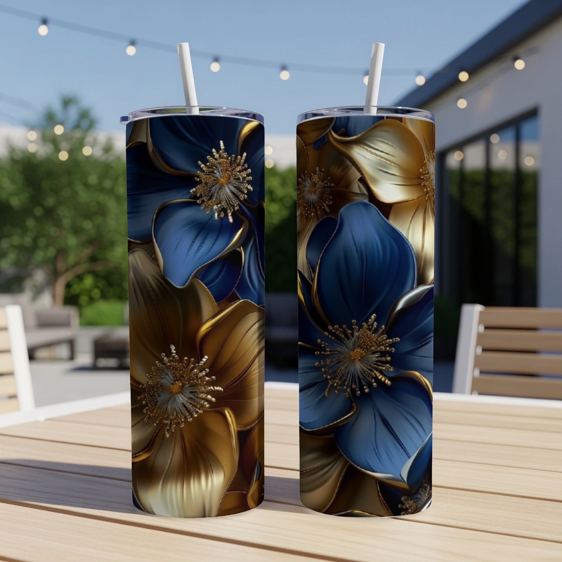 Two tumblers with a detailed blue and gold floral pattern.