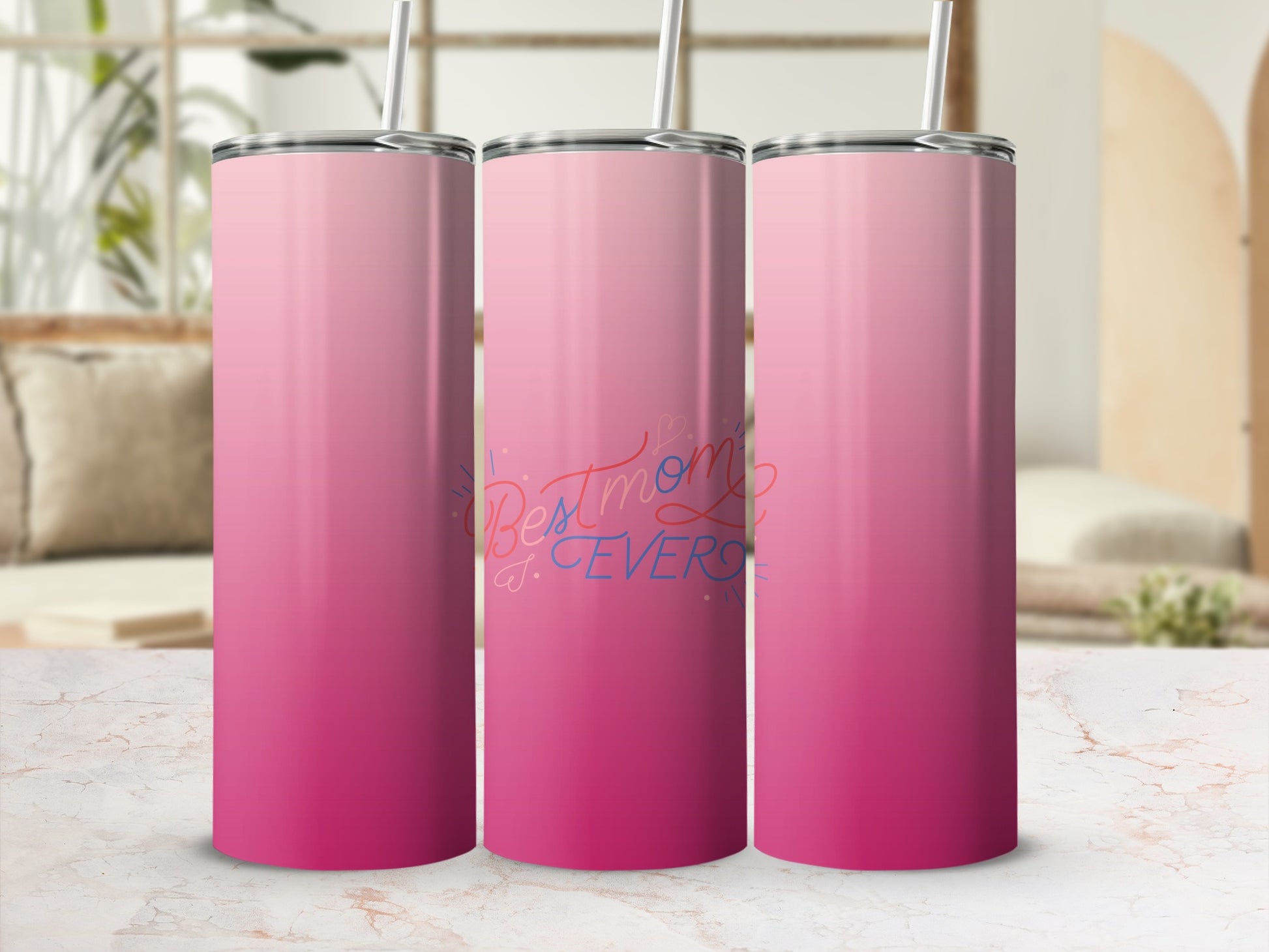 Pink ombre tumbler with "Best Mom Ever" text and straw.