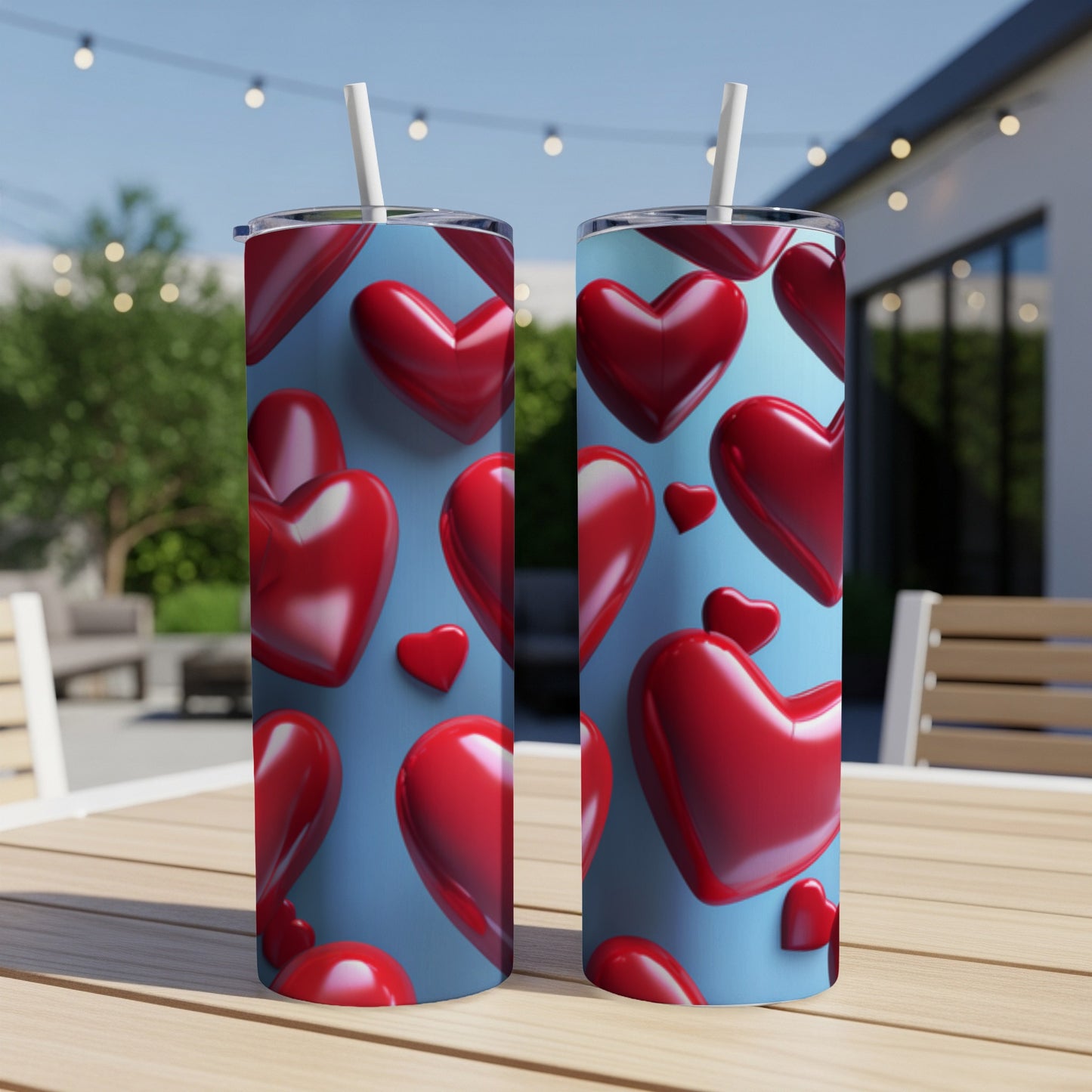 Two tumblers with a repeating pattern of red 3D hearts on a blue background.