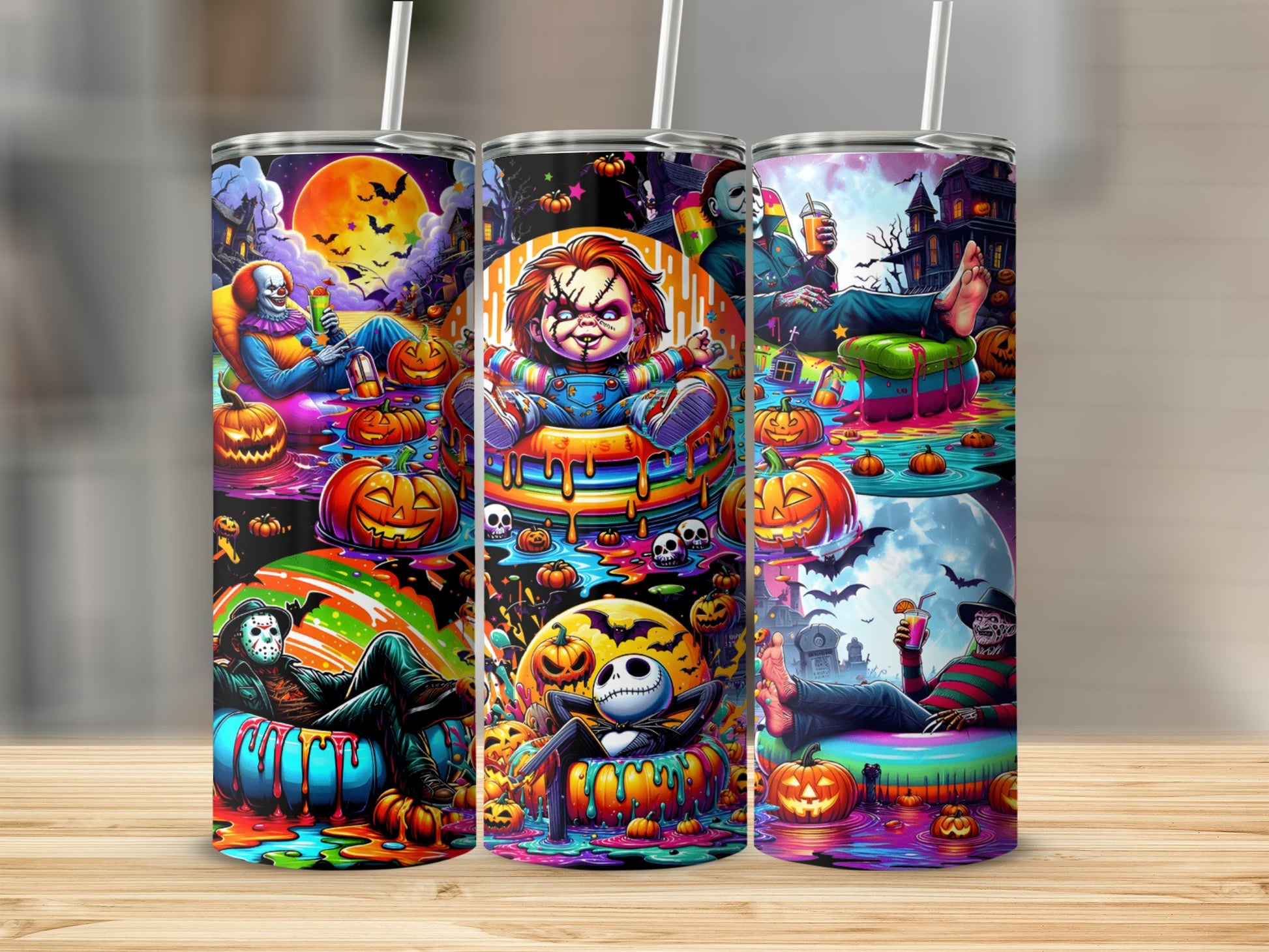 Three tumblers with Halloween horror movie characters and pumpkins.