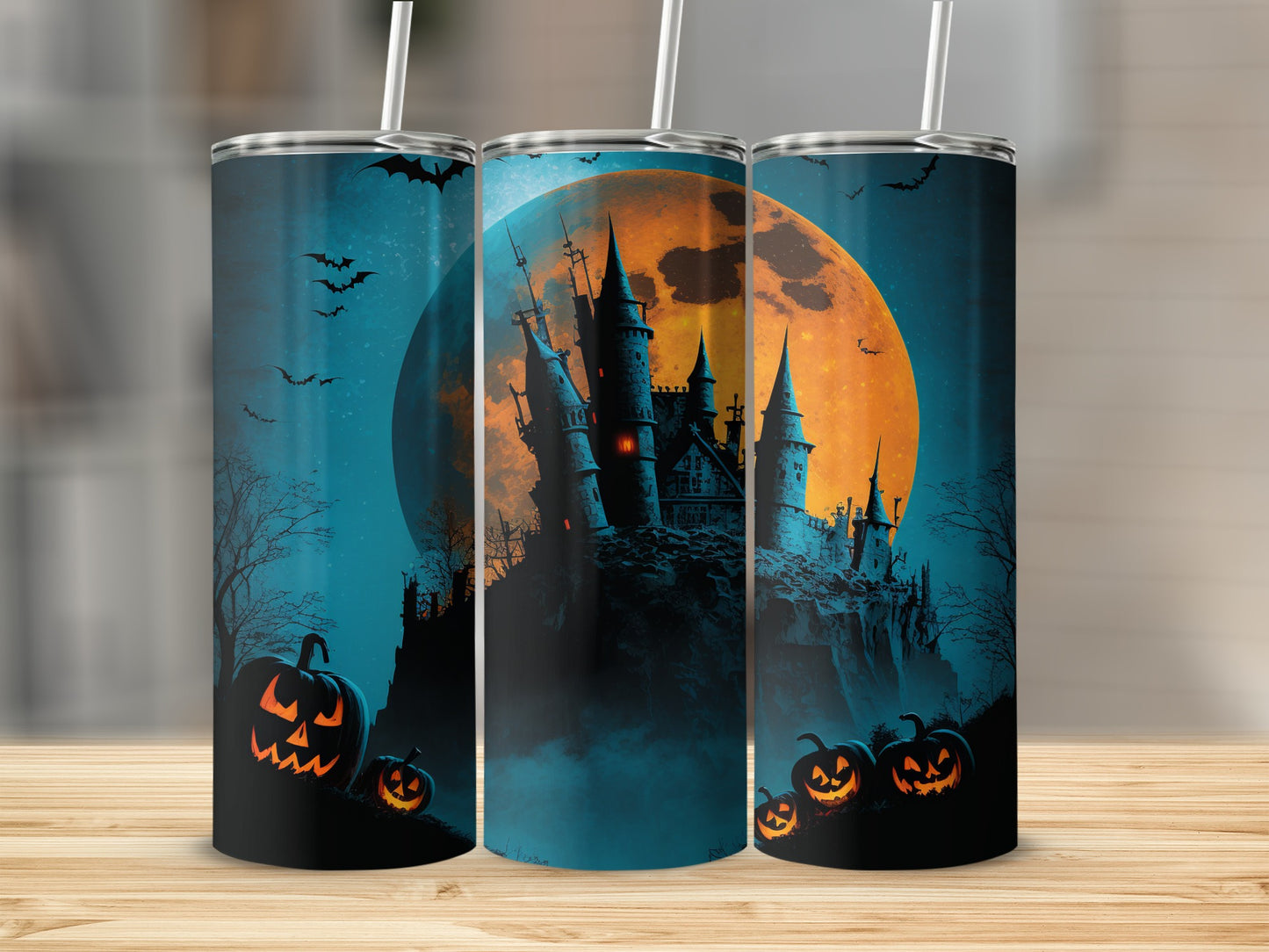 Three tumblers with Halloween castle, full moon, bats, and carved pumpkins.