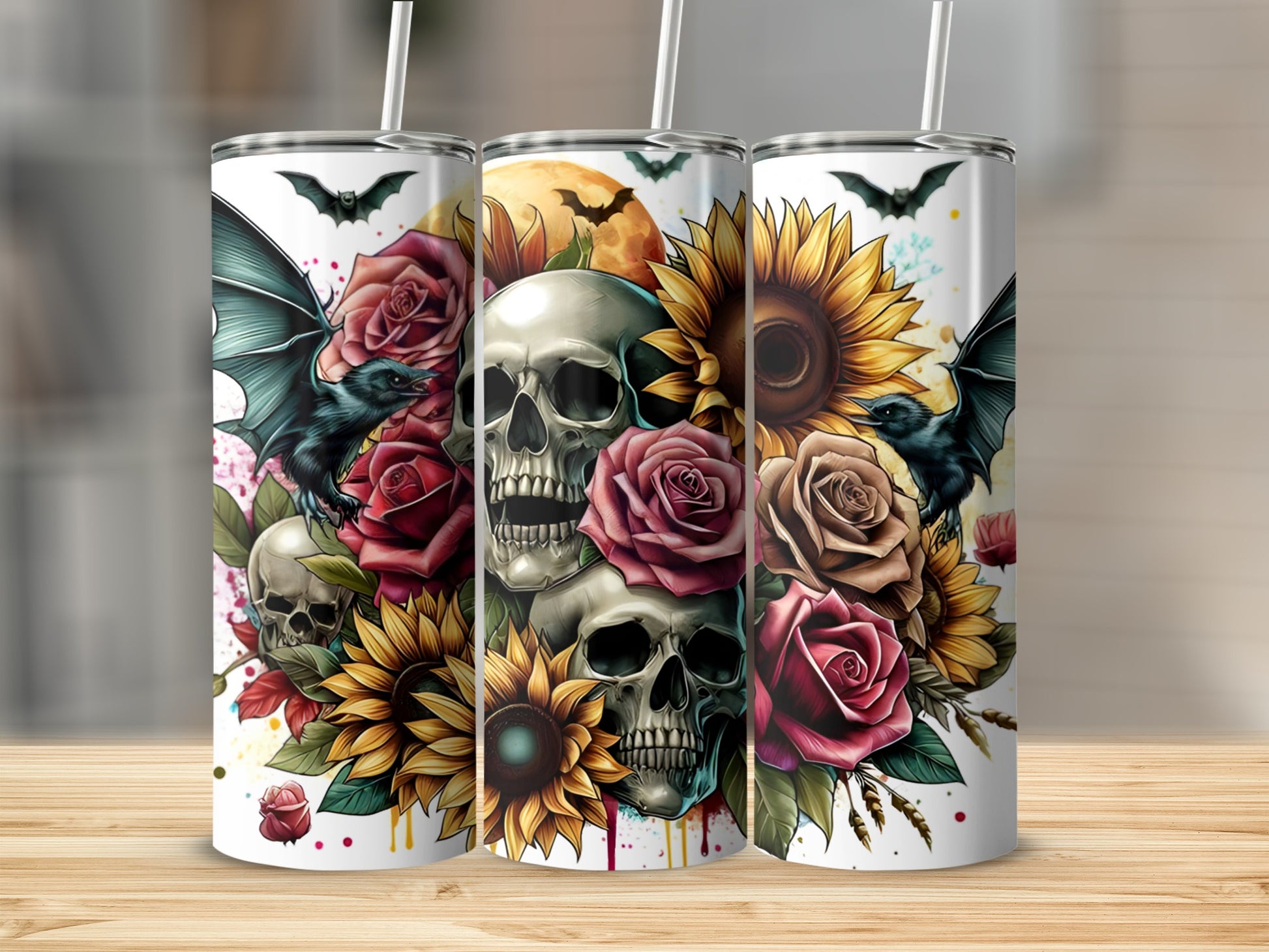 Skulls, bats, sunflowers, and roses on a white tumbler.