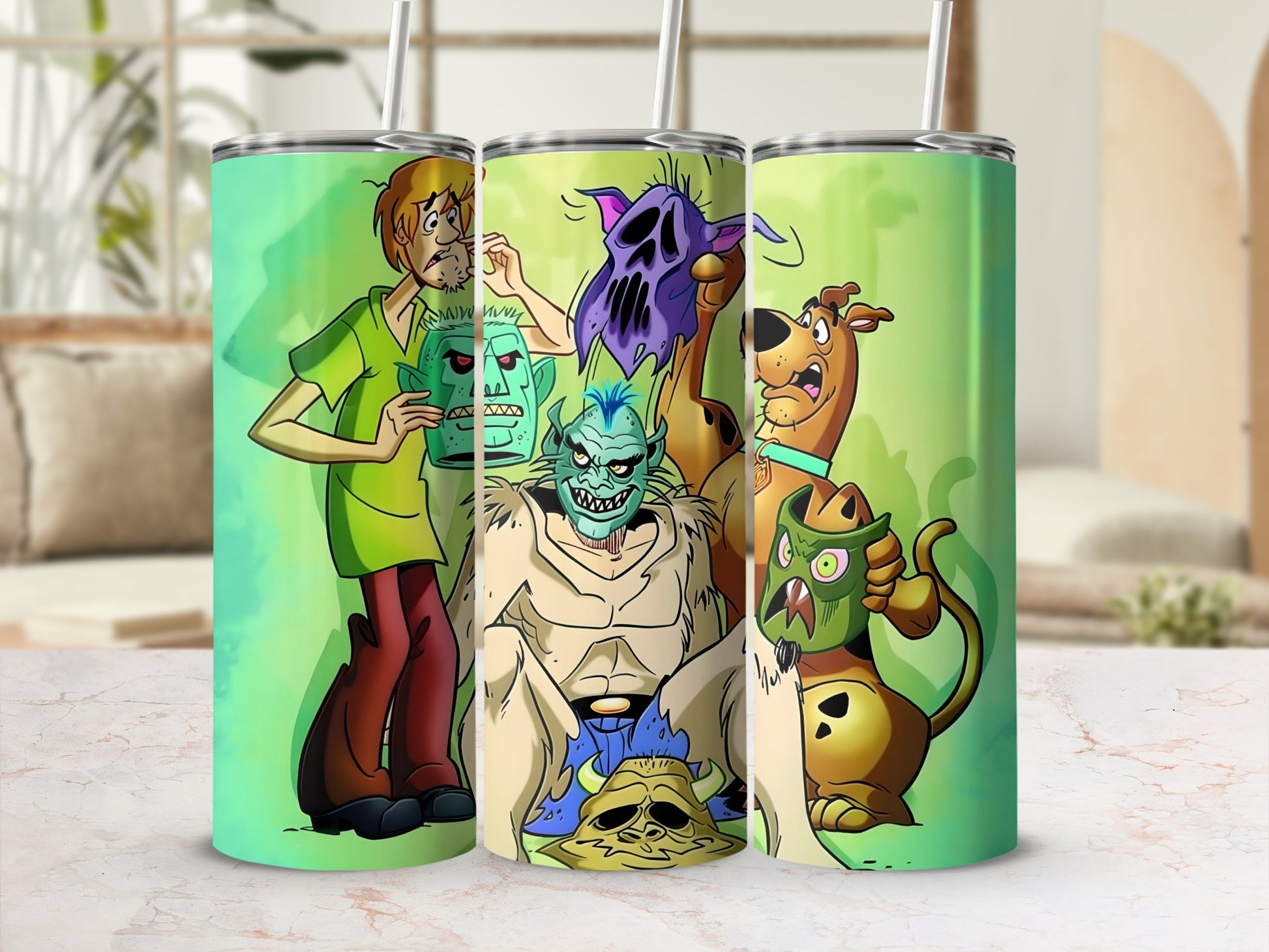 Scooby-Doo characters Shaggy, Scooby, and monsters on a green tumbler.