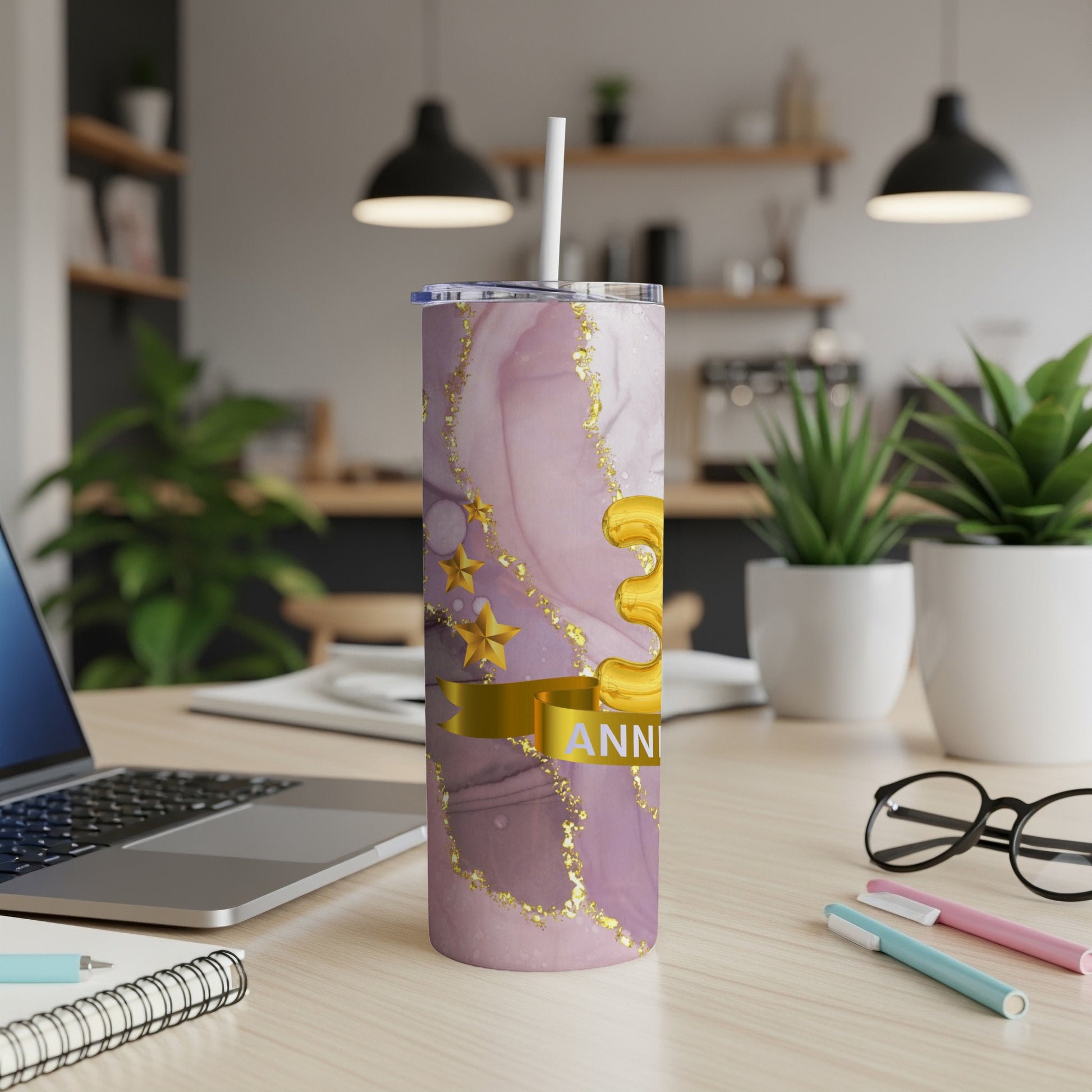 Marble tumbler with gold stars and banner that reads "ANNIVERSARY".